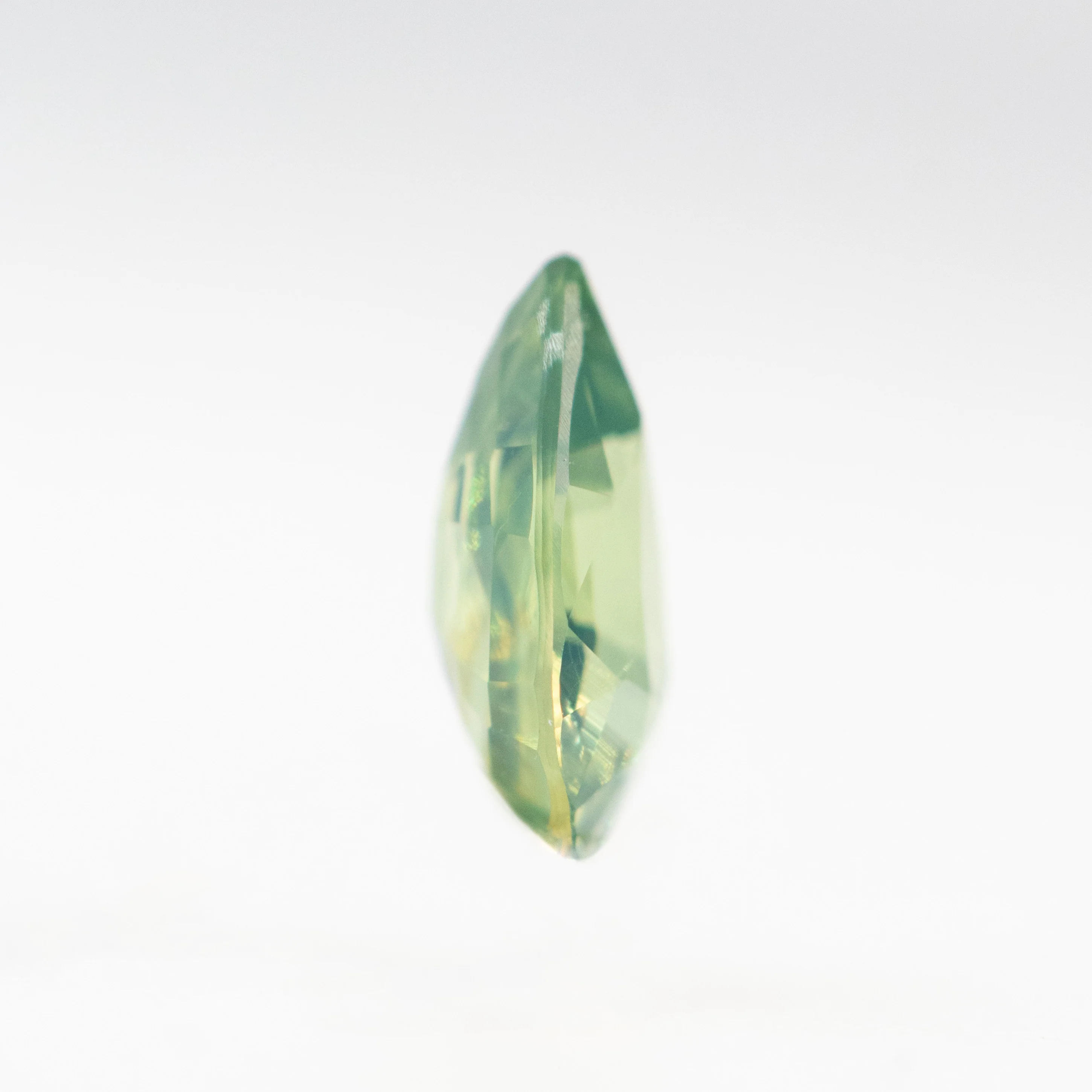 0.62 Carat Light Green Pear Sapphire for Custom Work - Inventory Code LGPS062 - Image 5