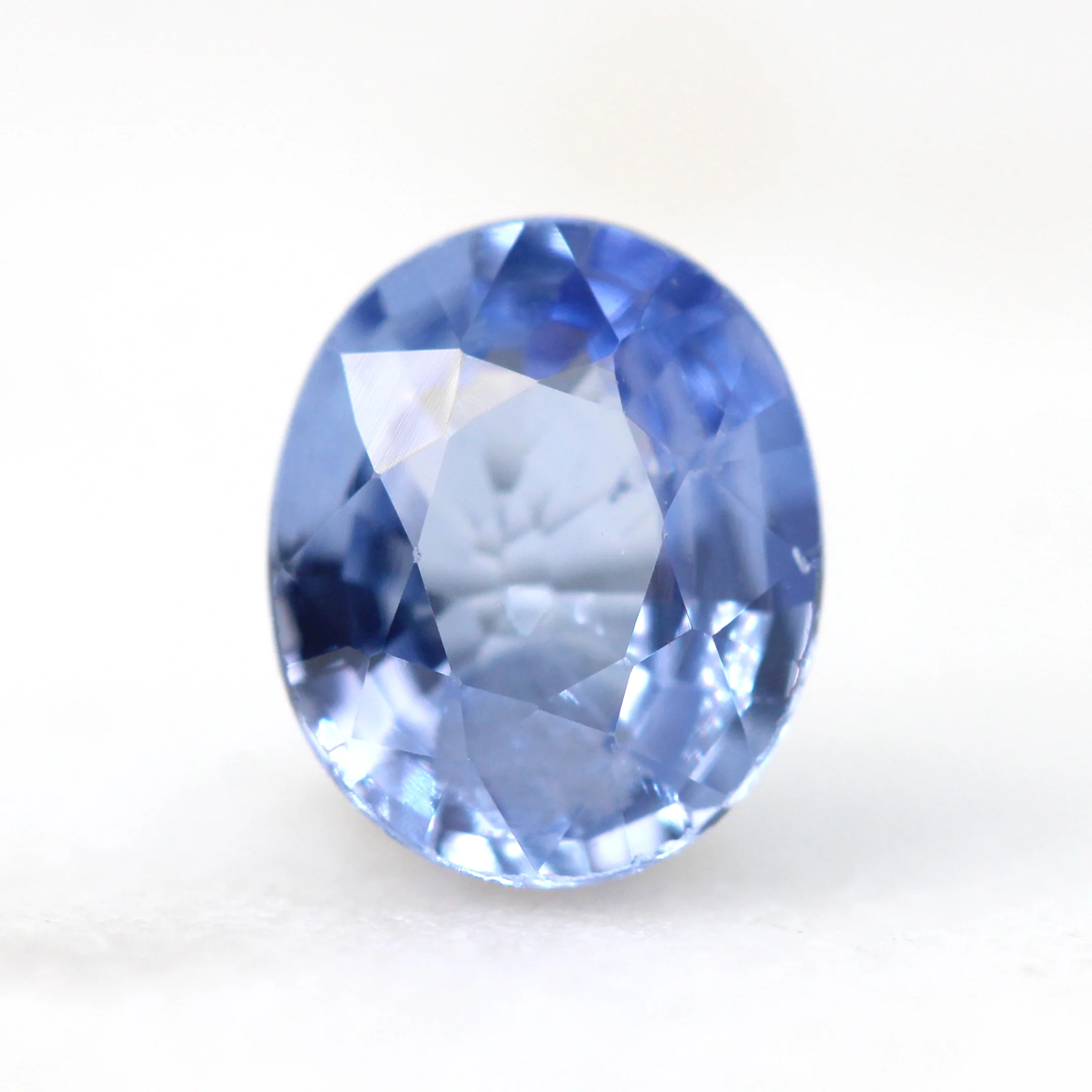 0.67 Carat Light Blue Oval Montana Sapphire for Custom Work - Inventory Code LBOS067