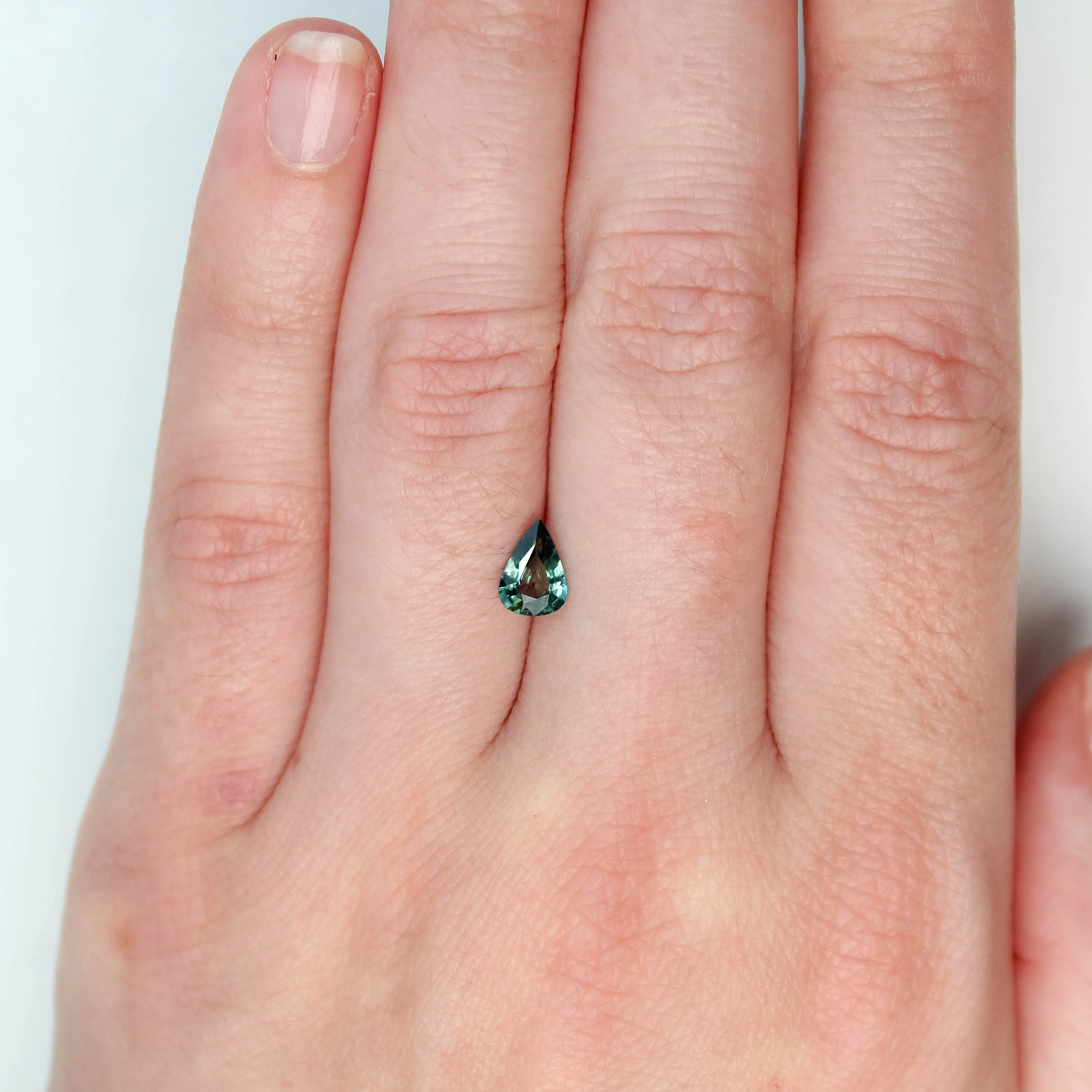 0.68 Carat Teal Pear Sapphire for Custom Work - Inventory Code TPS068 - Image 2