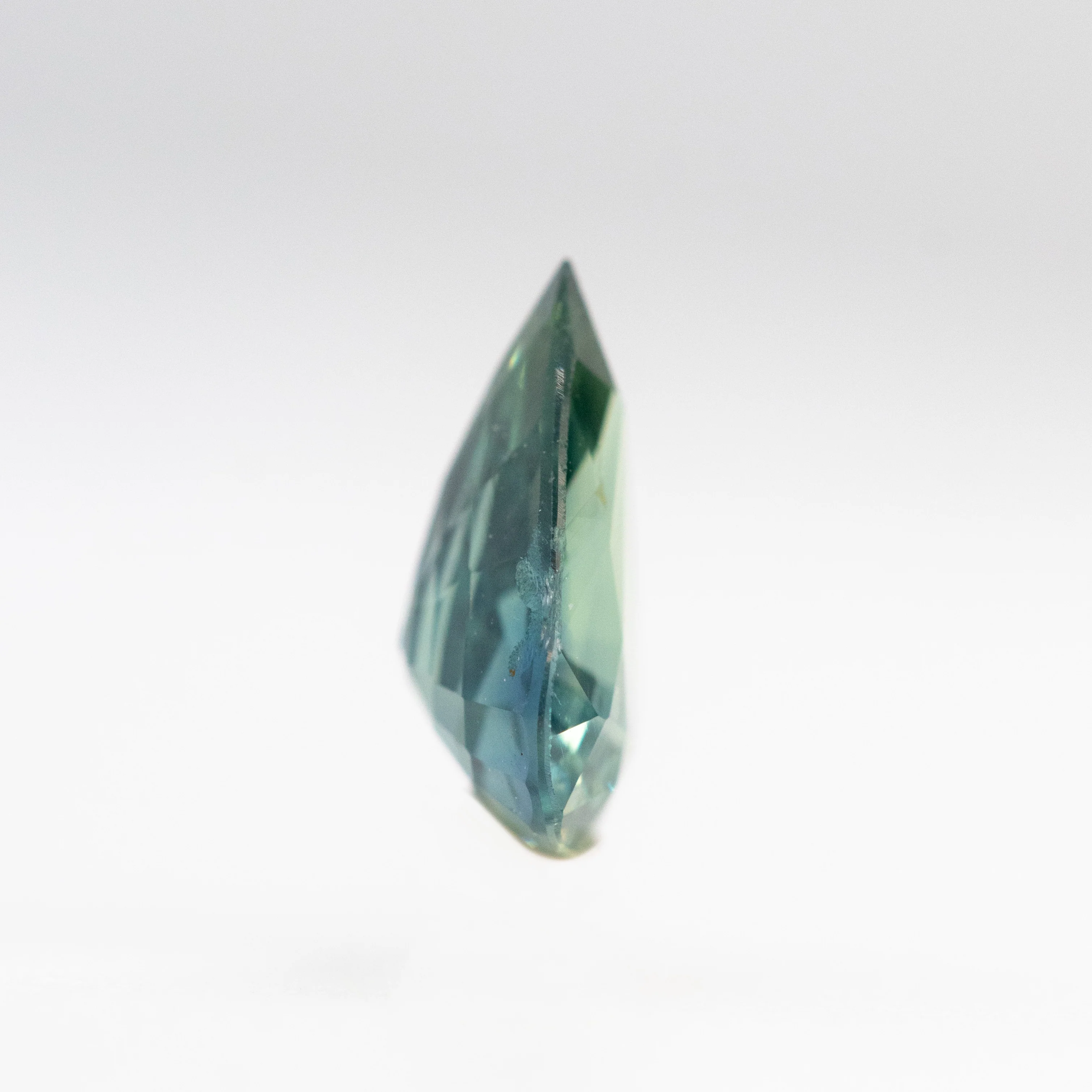 0.68 Carat Teal Pear Sapphire for Custom Work - Inventory Code TPS068 - Image 5