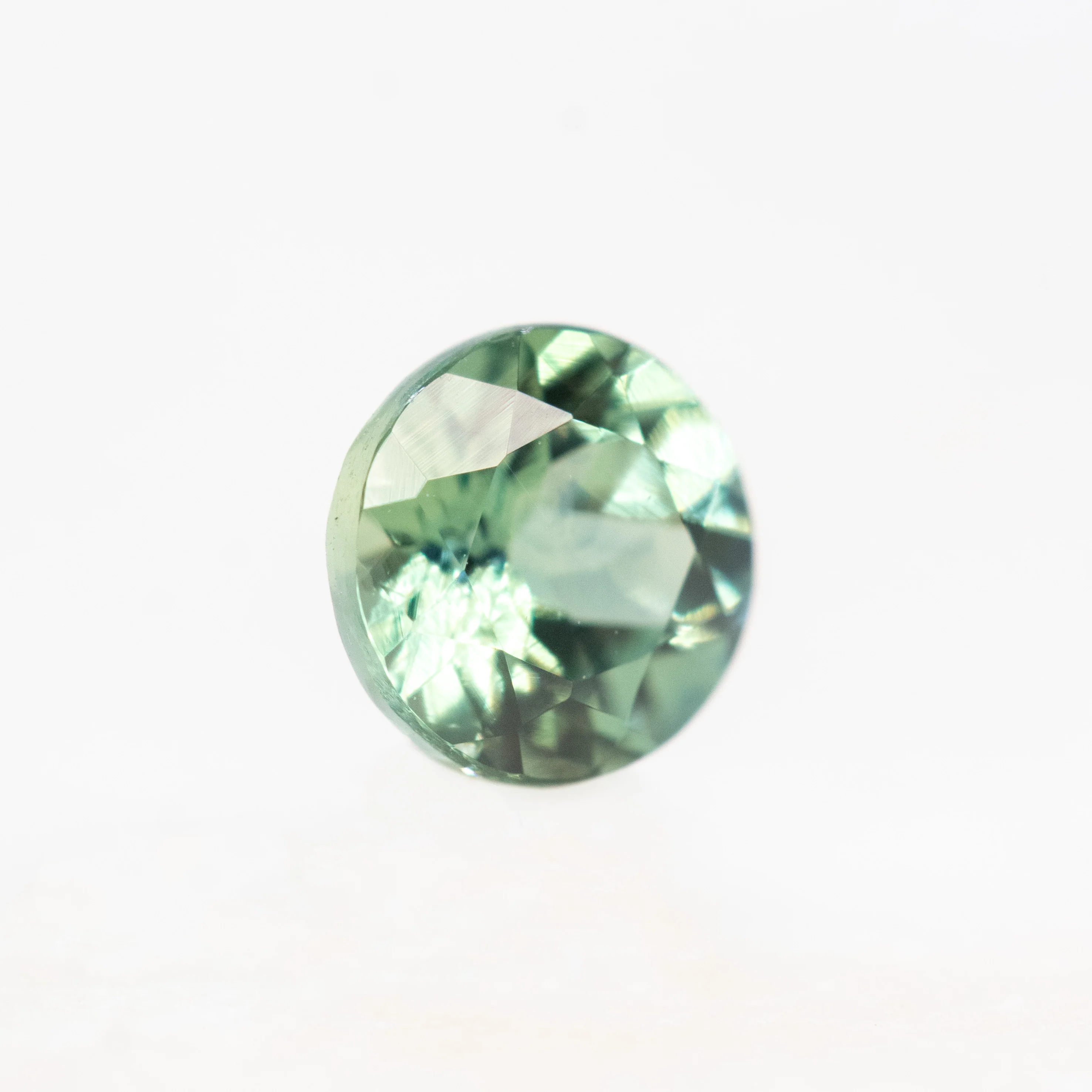 0.72 Carat Round Green Montana Sapphire for Custom Work - Inventory Code TGRS072 - Image 4