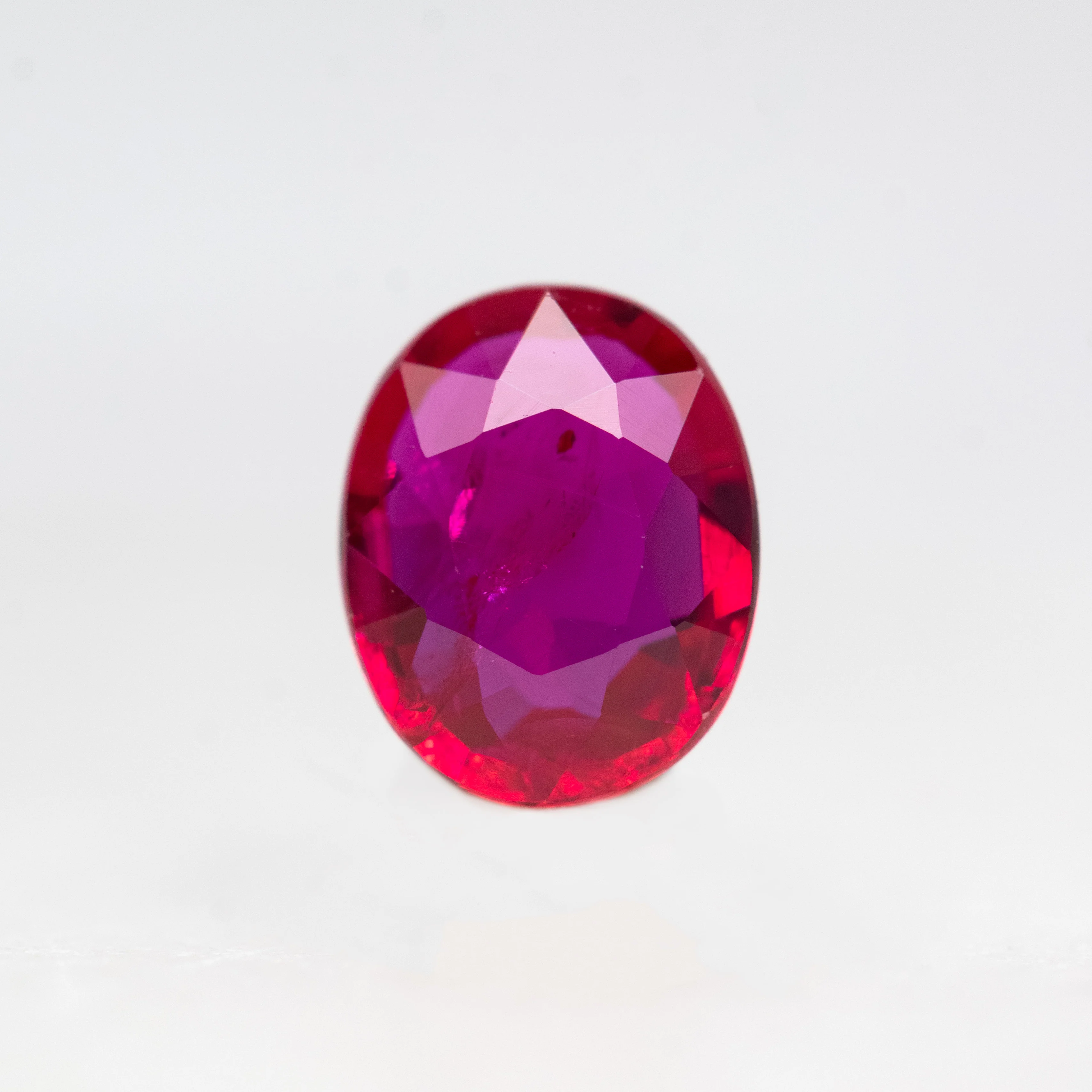 0.76 Carat Ruby Red Oval Sapphire for Custom Work - Inventory Code ROS076