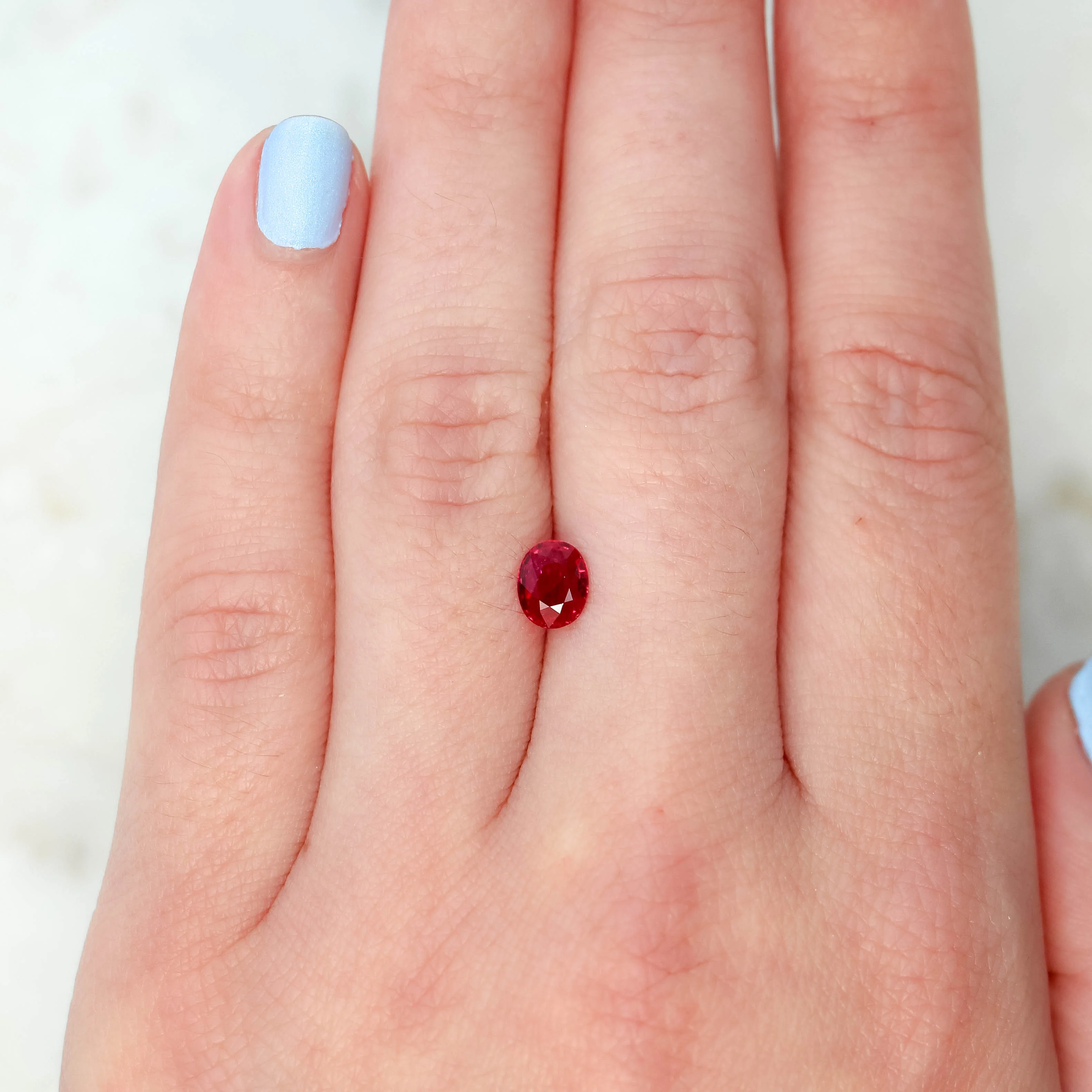 0.76 Carat Ruby Red Oval Sapphire for Custom Work - Inventory Code ROS076 - Image 2