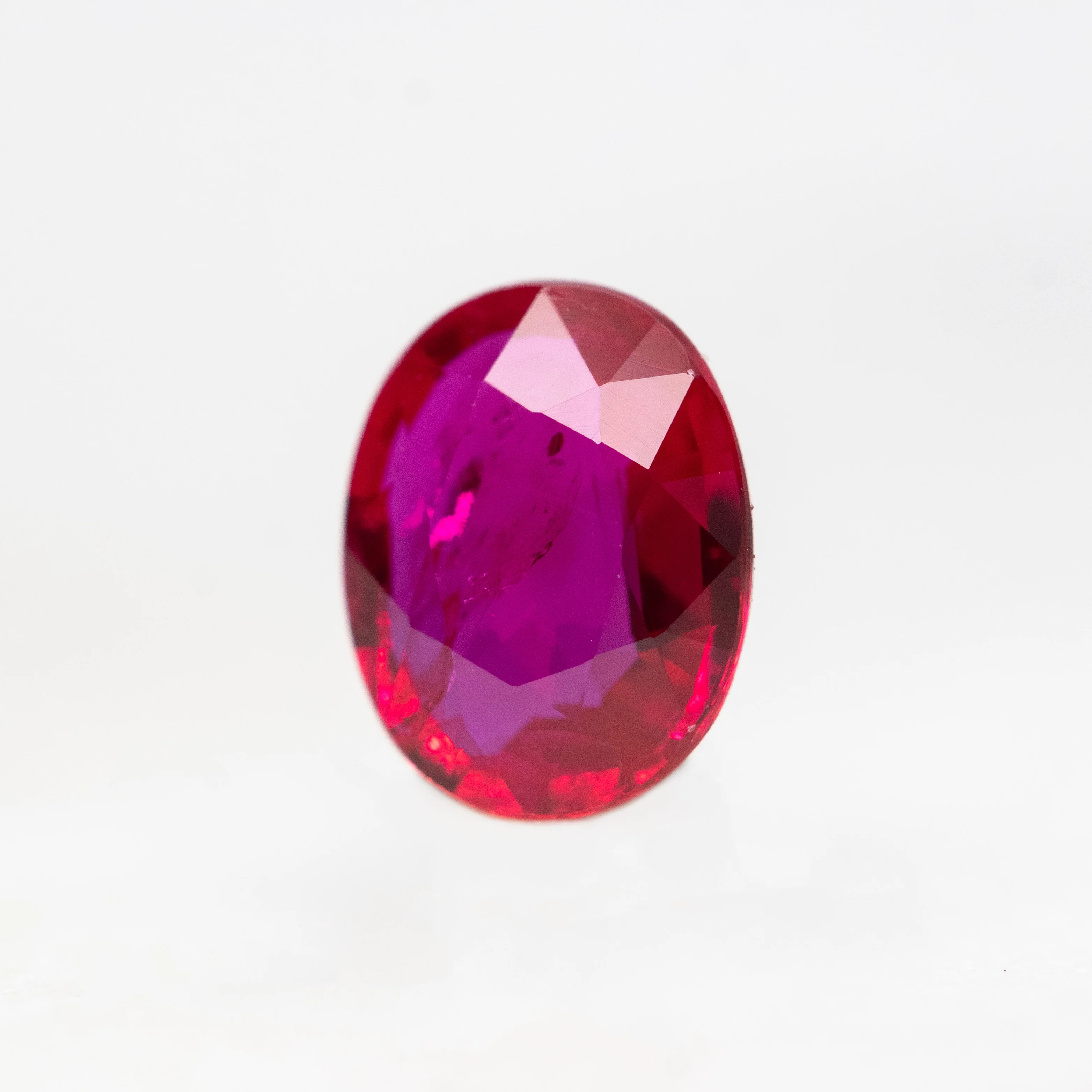 0.76 Carat Ruby Red Oval Sapphire for Custom Work - Inventory Code ROS076 - Image 3