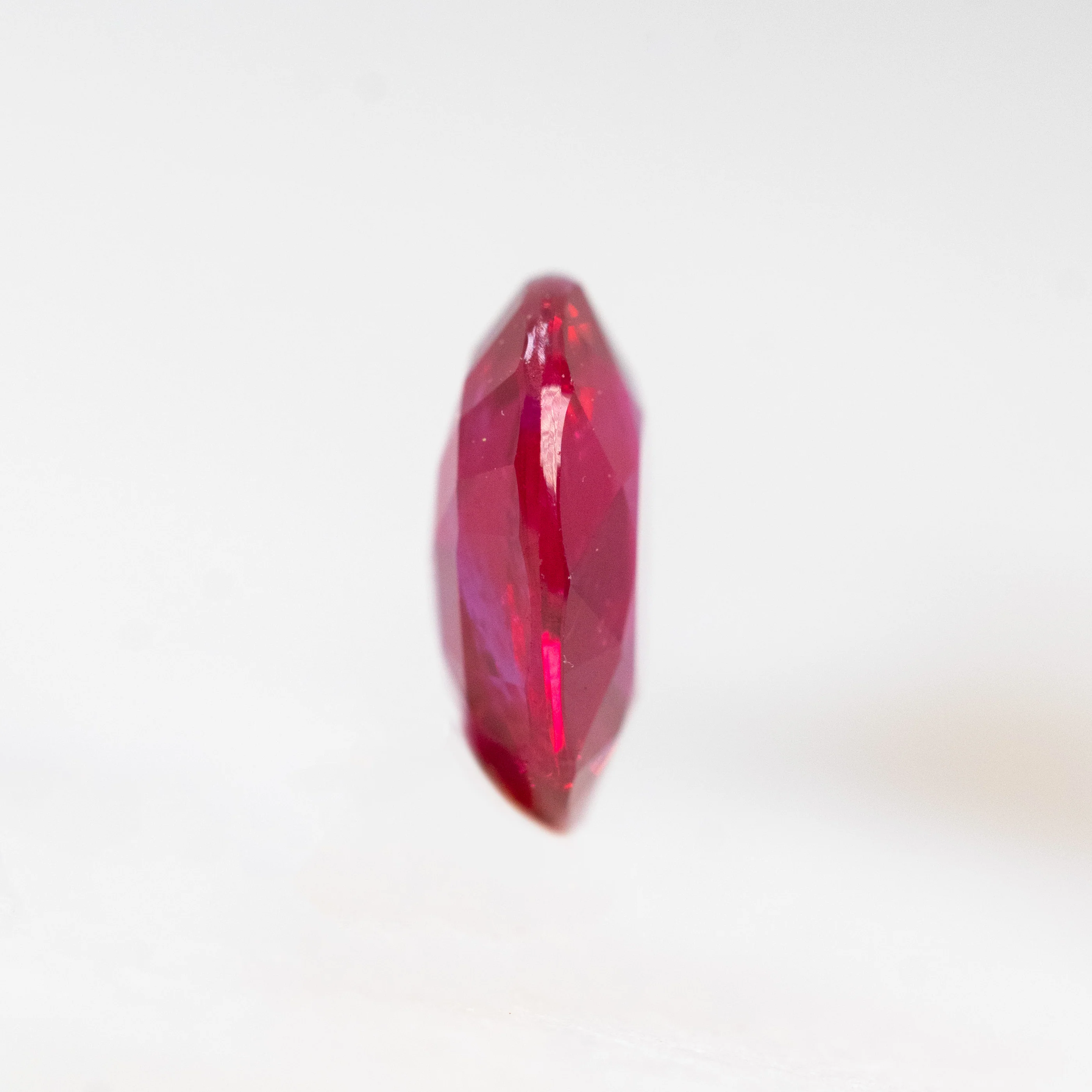 0.76 Carat Ruby Red Oval Sapphire for Custom Work - Inventory Code ROS076 - Image 5
