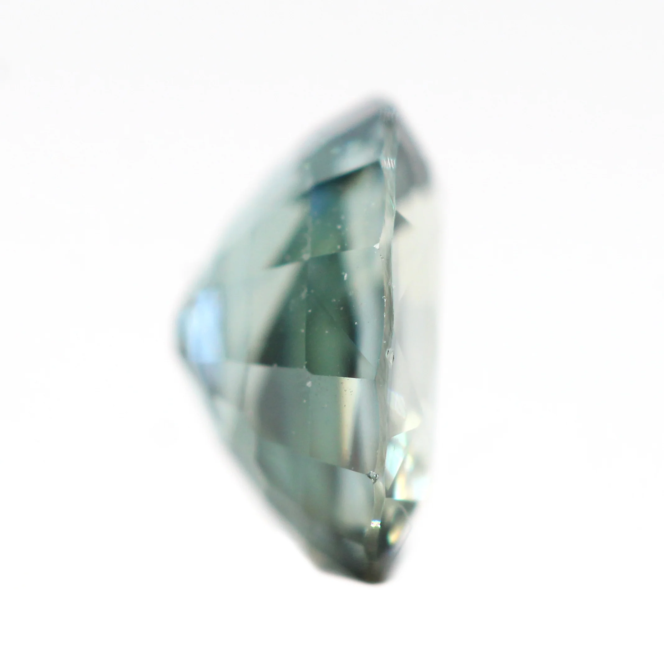 0.81 Carat Light Teal Oval Sapphire for Custom Work - Inventory Code TOS081 - Image 5