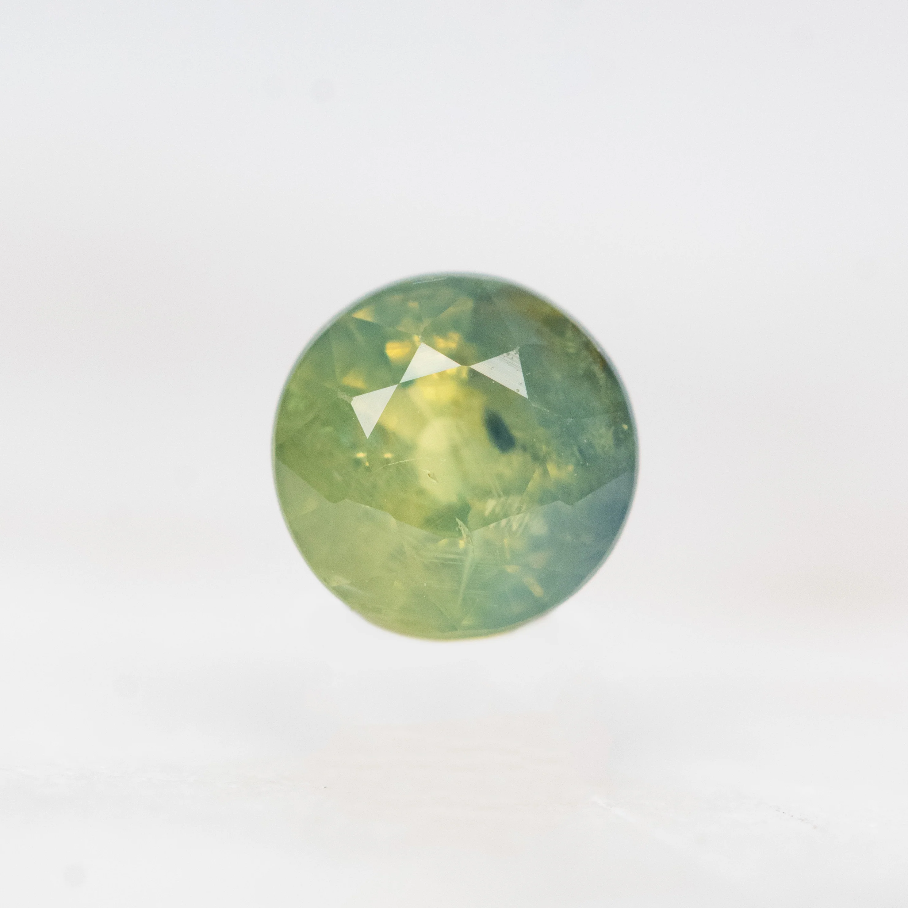 0.85 Carat Bicolor Green and Blue Round Sapphire for Custom Work - Inventory Code BCRS085
