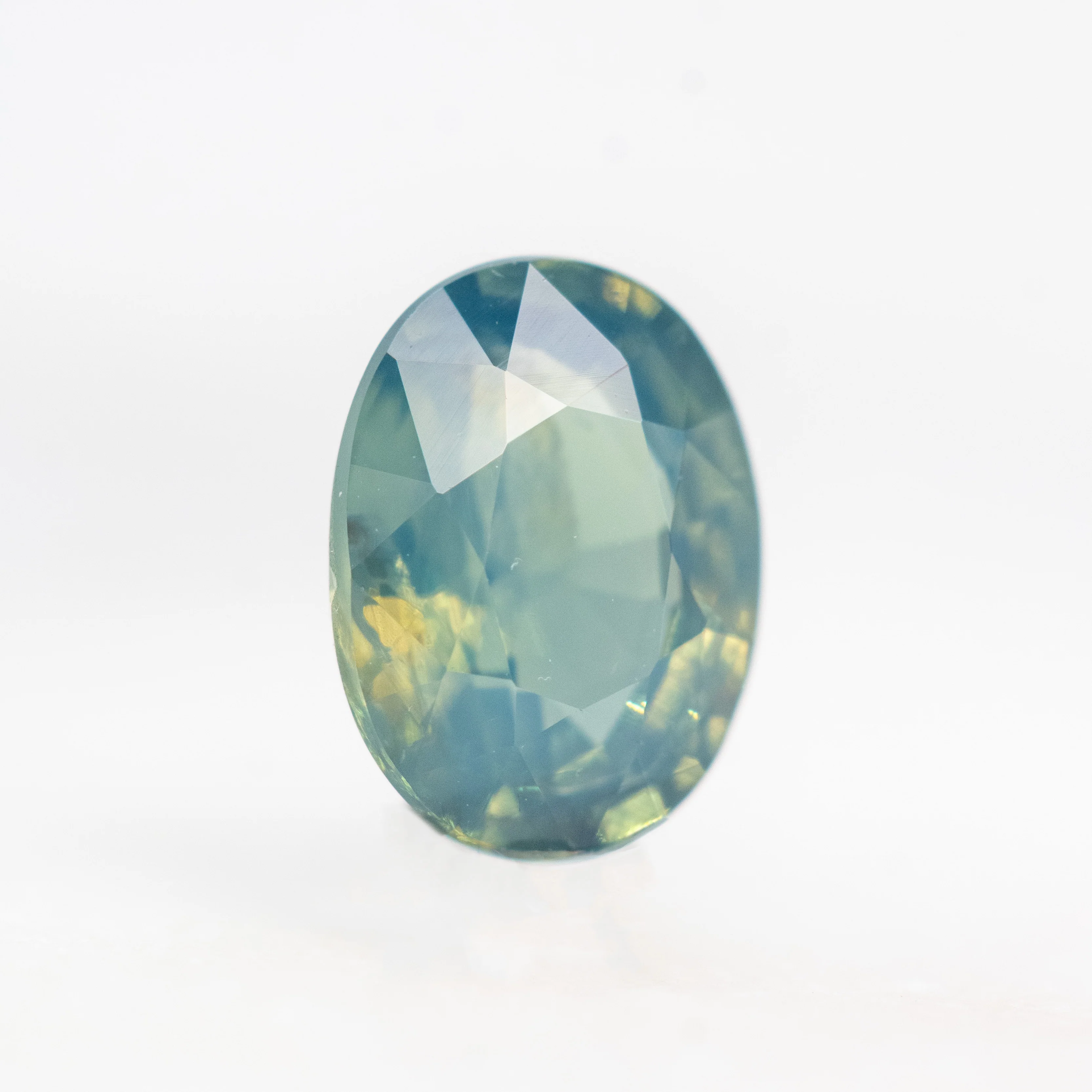 0.90 Carat Multicolor Teal Oval Sapphire for Custom Work - Inventory Code MCOS090 - Image 4