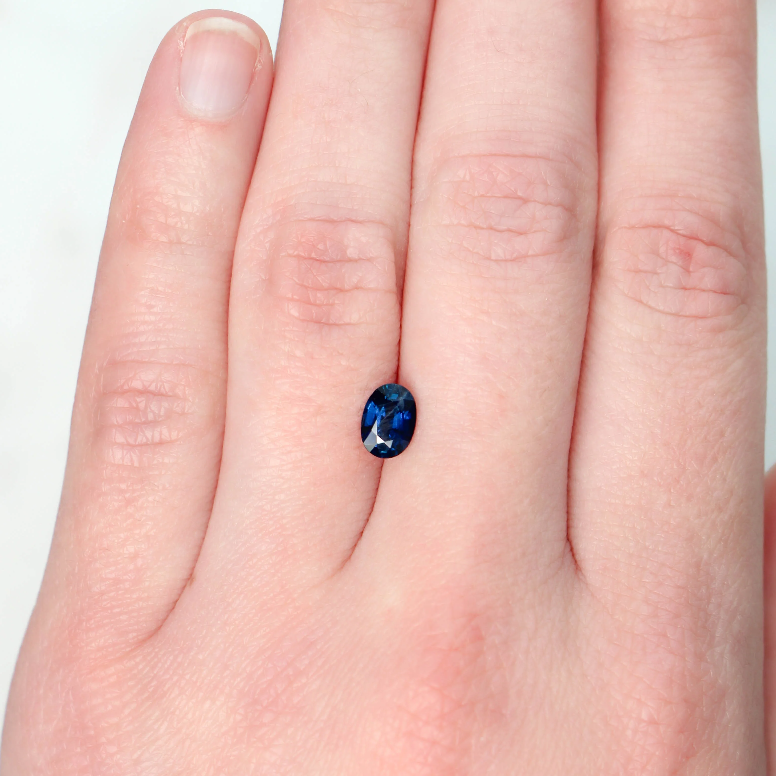 0.91 Carat Deep Blue Oval Sapphire for Custom Work - Inventory Code BOS091 - Image 2