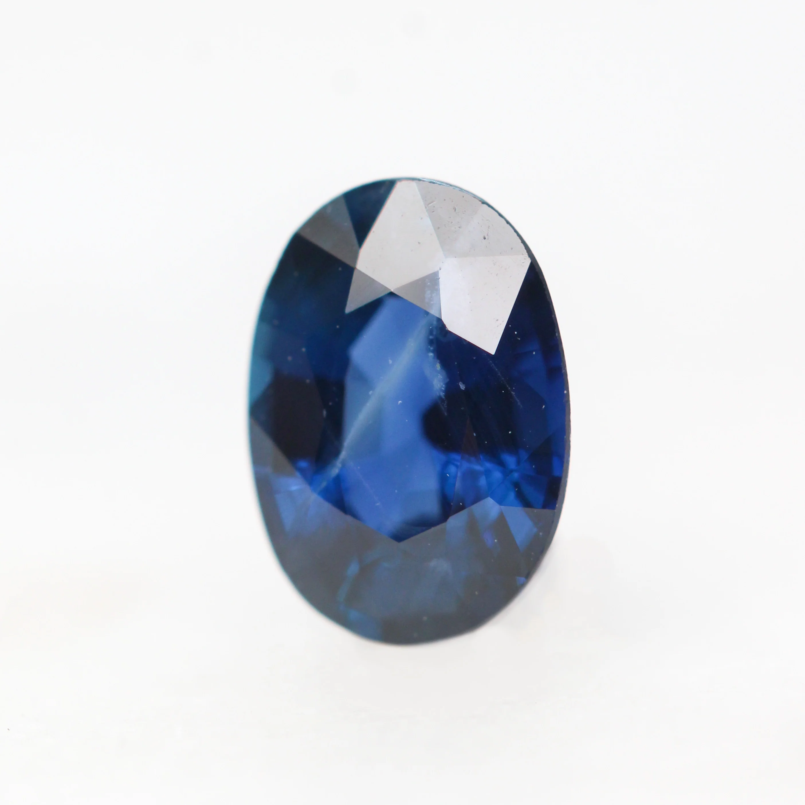 0.91 Carat Deep Blue Oval Sapphire for Custom Work - Inventory Code BOS091 - Image 3