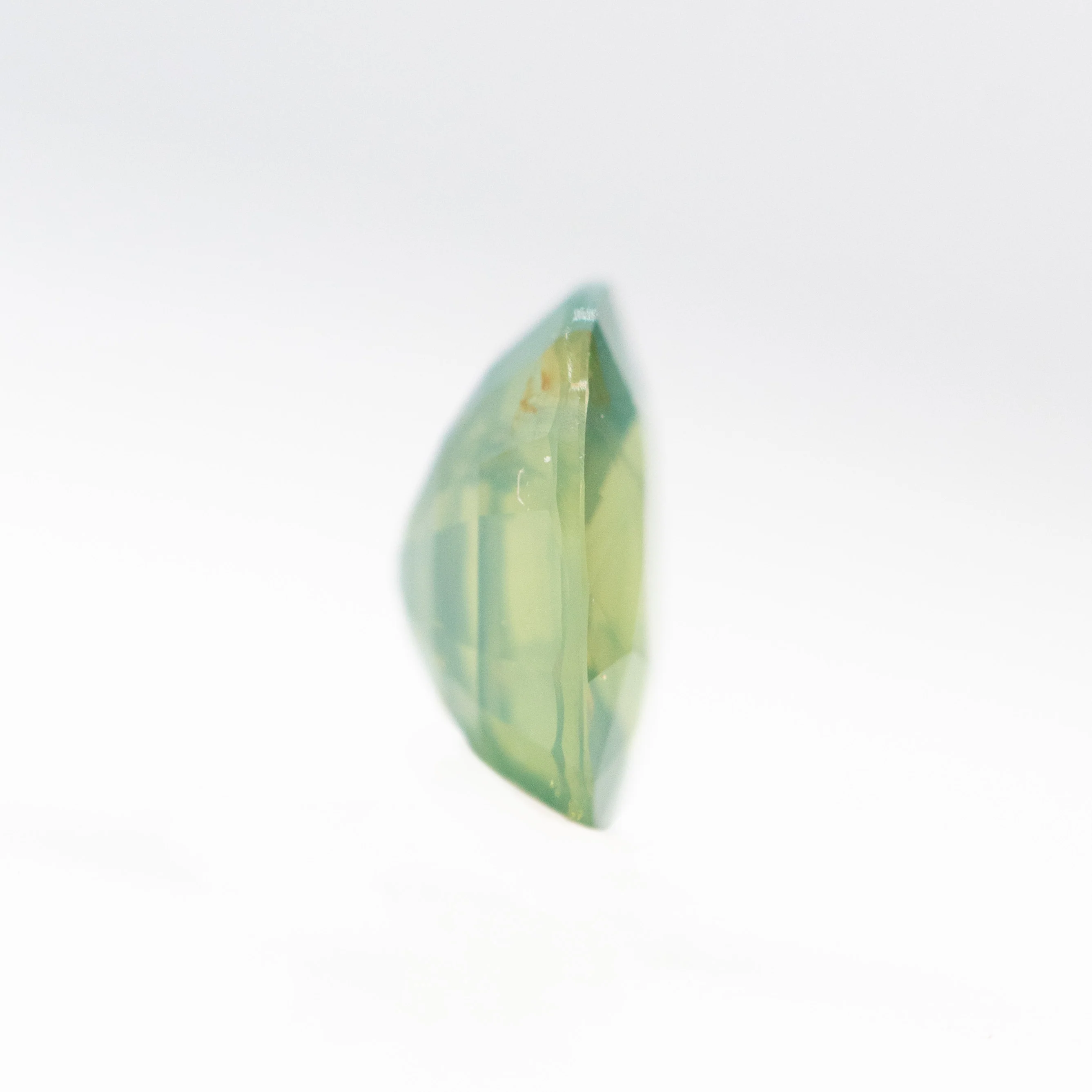 0.92 Carat Opalescent Yellow-Green Oval Sapphire for Custom Work - Inventory Code YGOS092 - Image 5