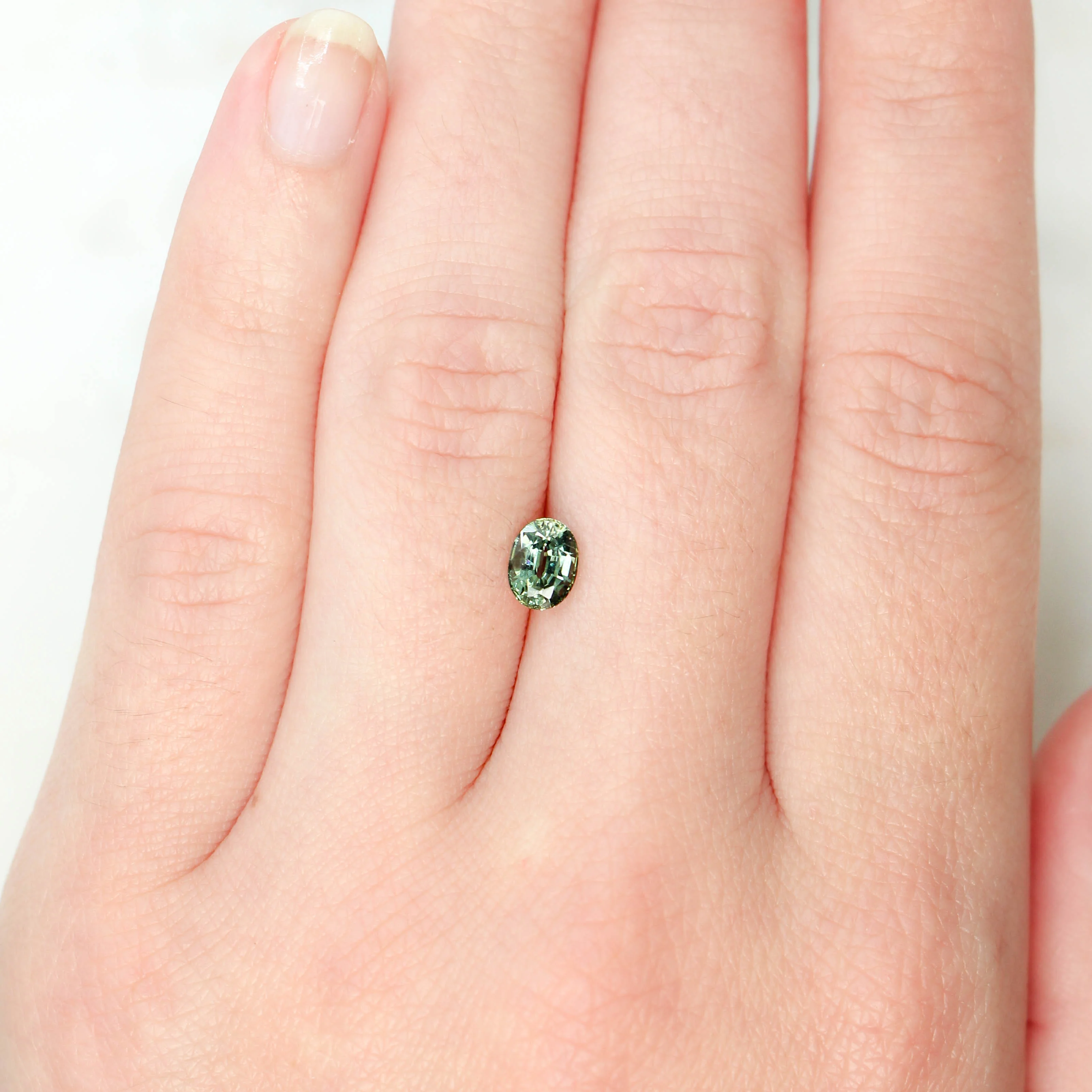 0.94 Carat Light Teal Oval Sapphire for Custom Work - Inventory Code LTOS094 - Image 2