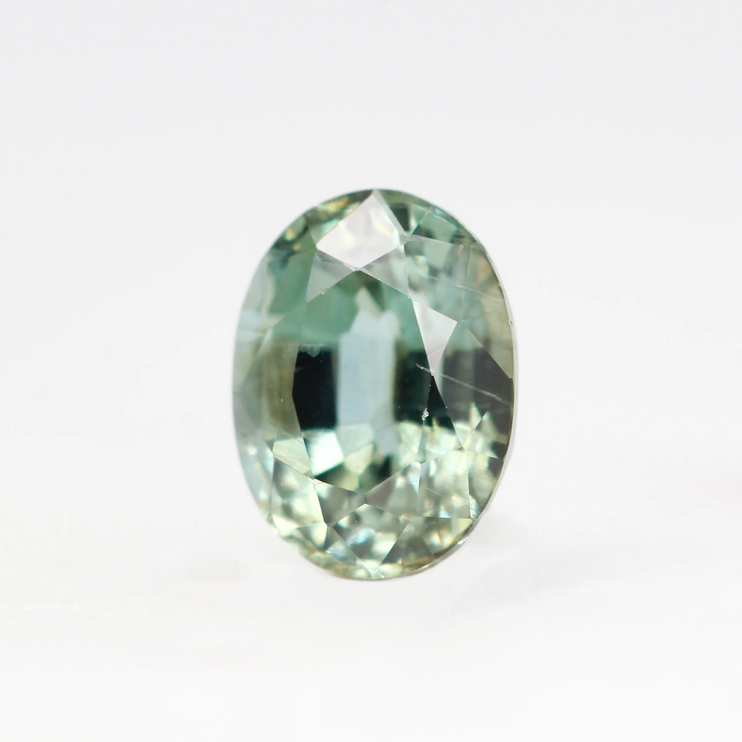 0.94 Carat Light Teal Oval Sapphire for Custom Work - Inventory Code LTOS094 - Image 3