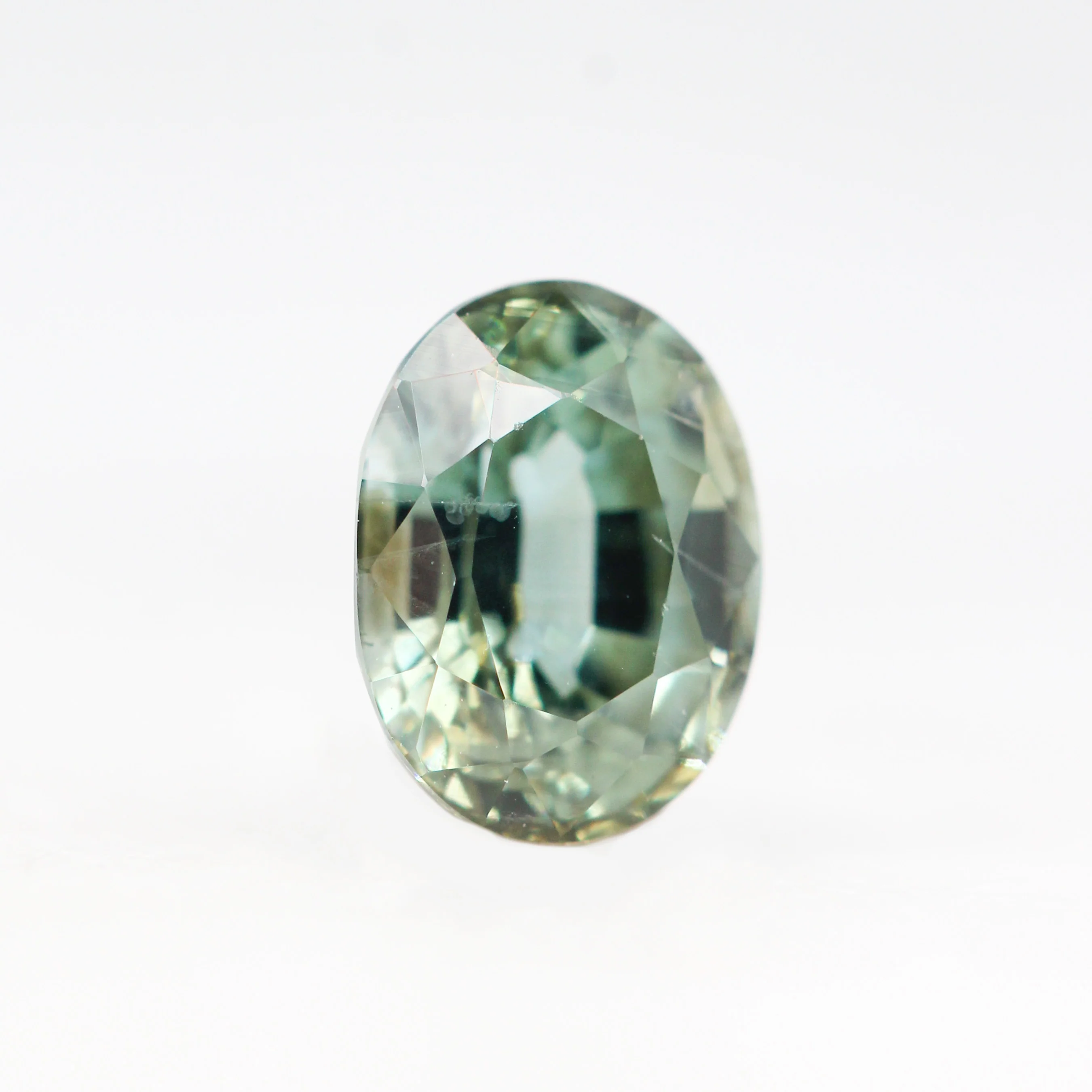 0.94 Carat Light Teal Oval Sapphire for Custom Work - Inventory Code LTOS094 - Image 4