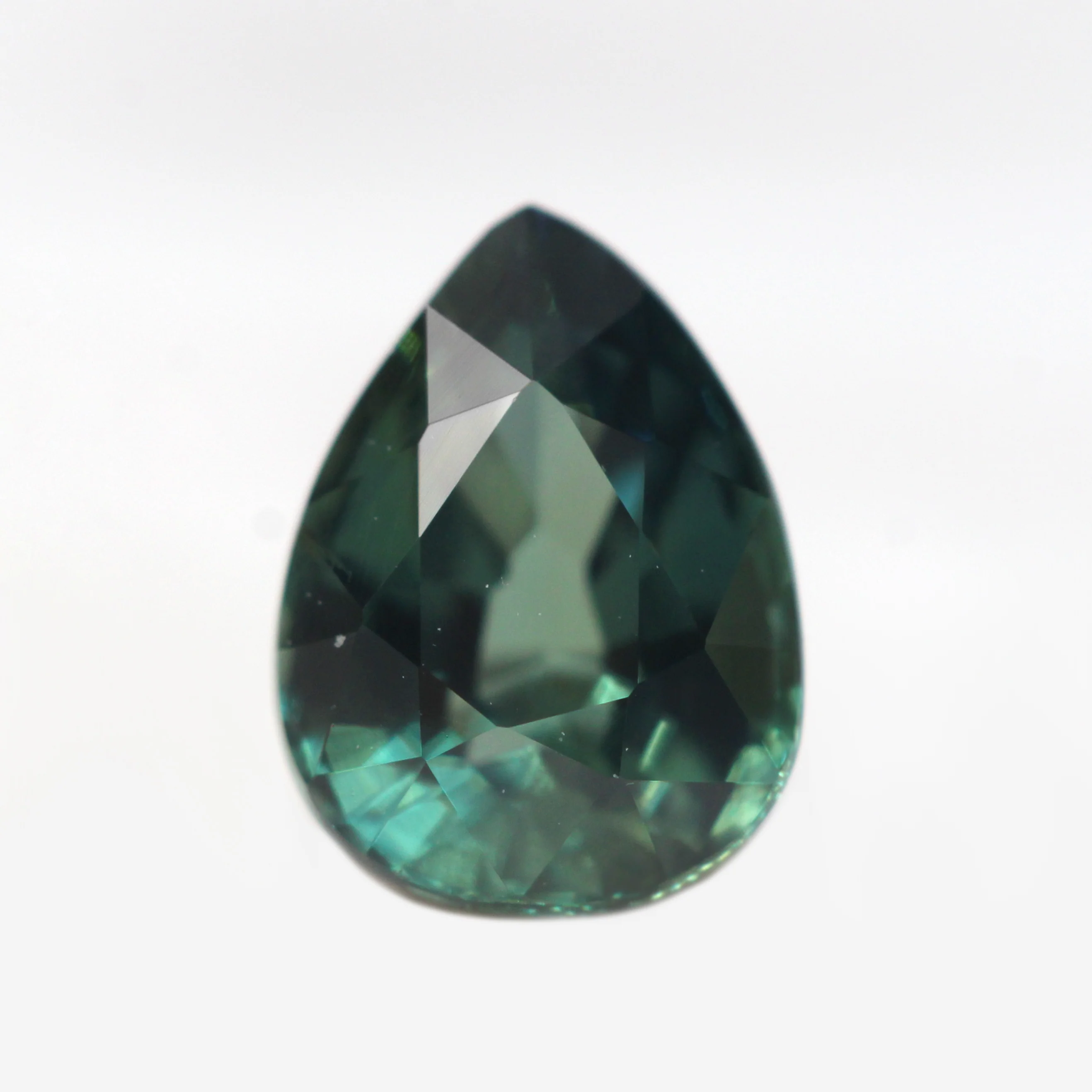 0.98 Carat Teal Green Pear Madagascar Sapphire for Custom Work - Inventory Code TGPS098
