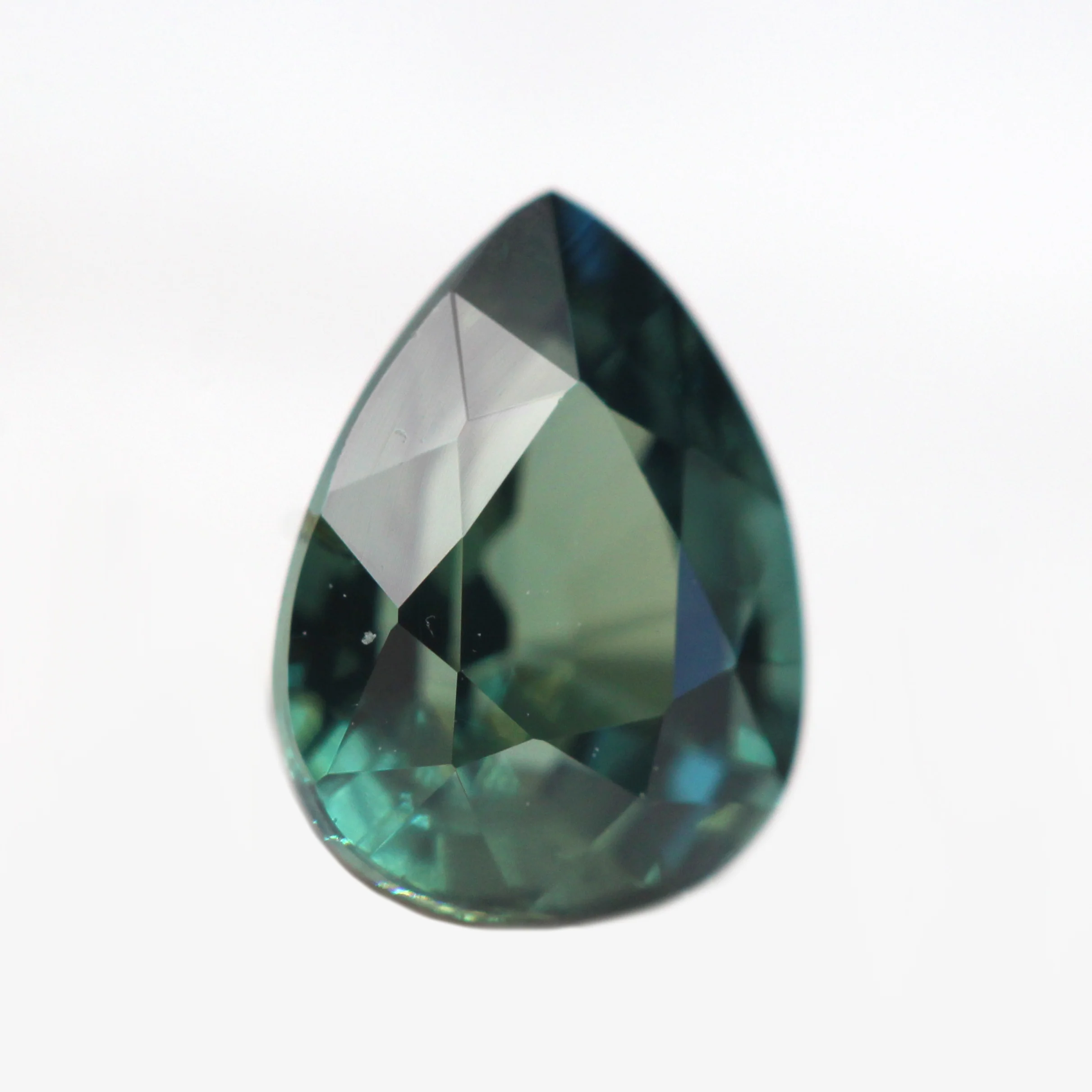 0.98 Carat Teal Green Pear Madagascar Sapphire for Custom Work - Inventory Code TGPS098 - Image 3