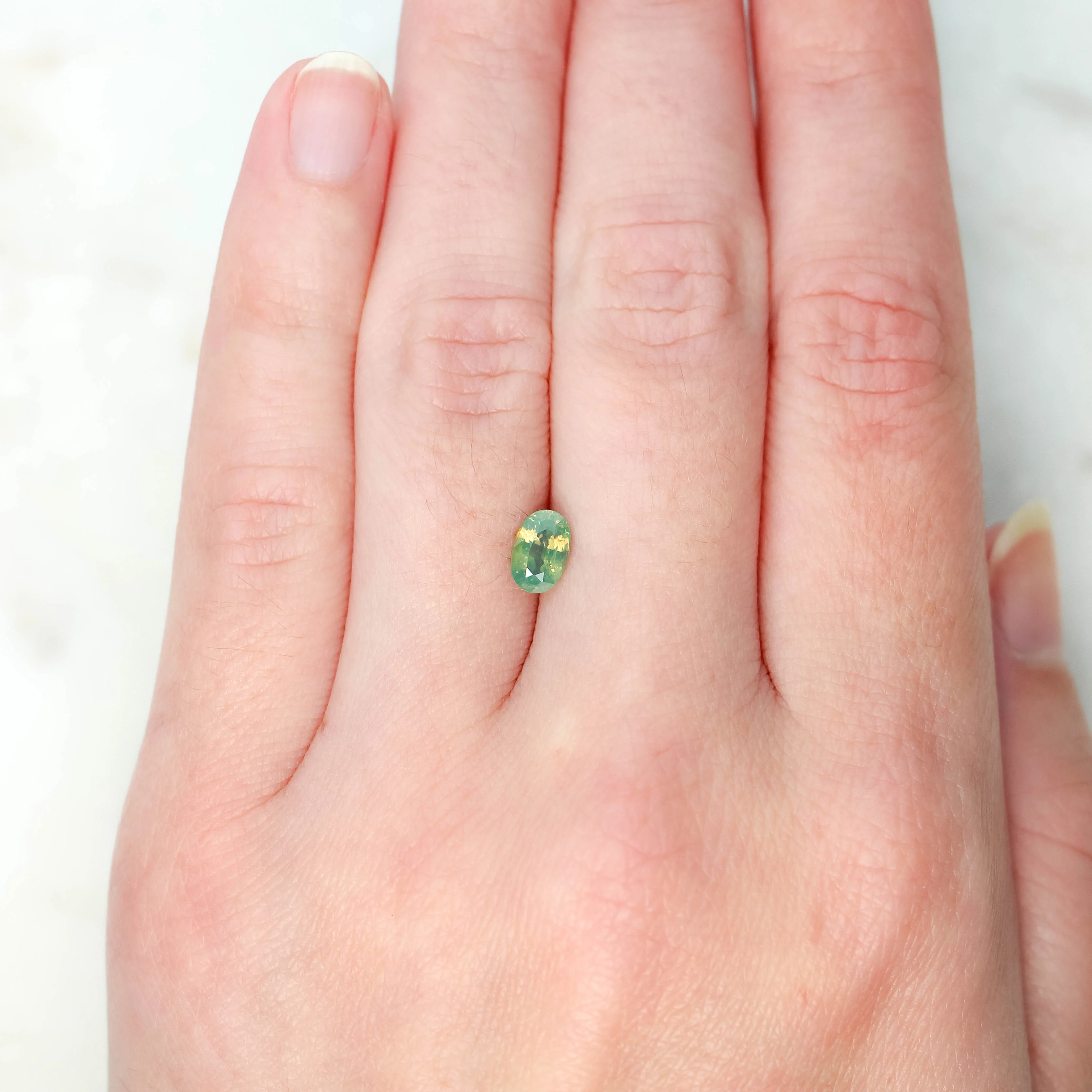 1.00 Carat Golden Teal Oval Sapphire for Custom Work - Inventory Code YGOS100 - Image 2