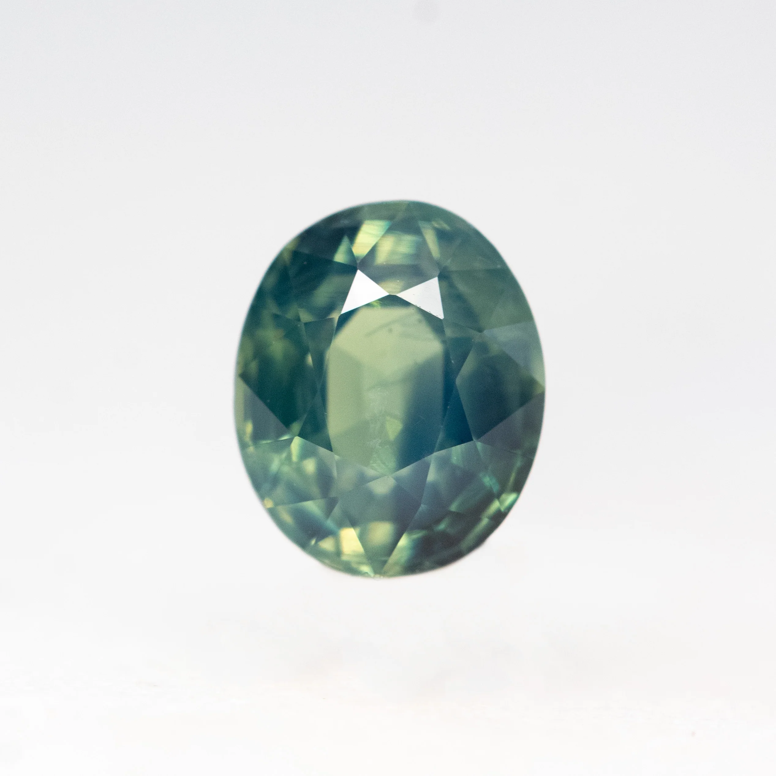 1.00 Carat Green Oval Sapphire for Custom Work - Inventory Code GBOS100