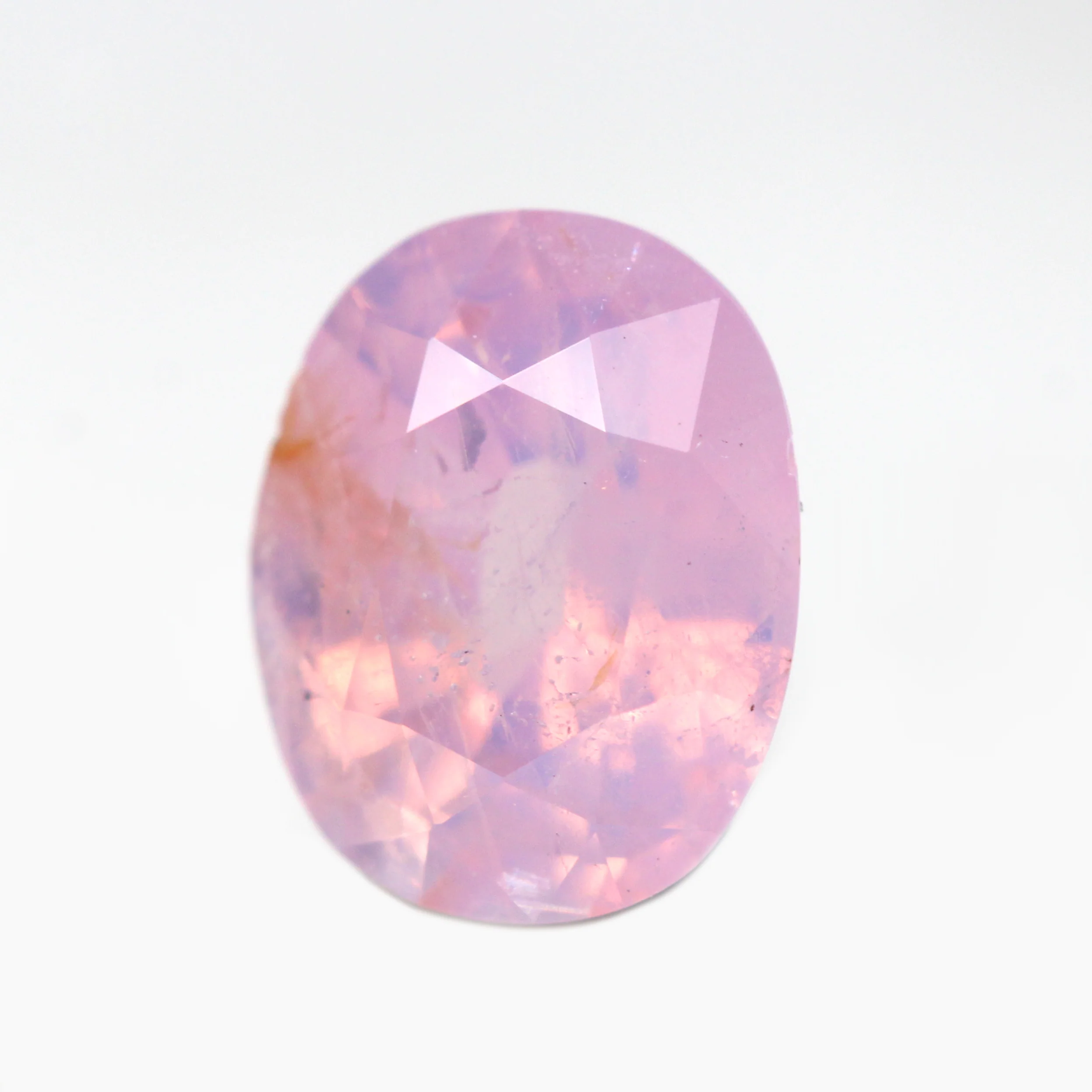 1.01 Carat Opalescent Pink Oval Sapphire for Custom Work - Inventory Code OPS101 - Image 3