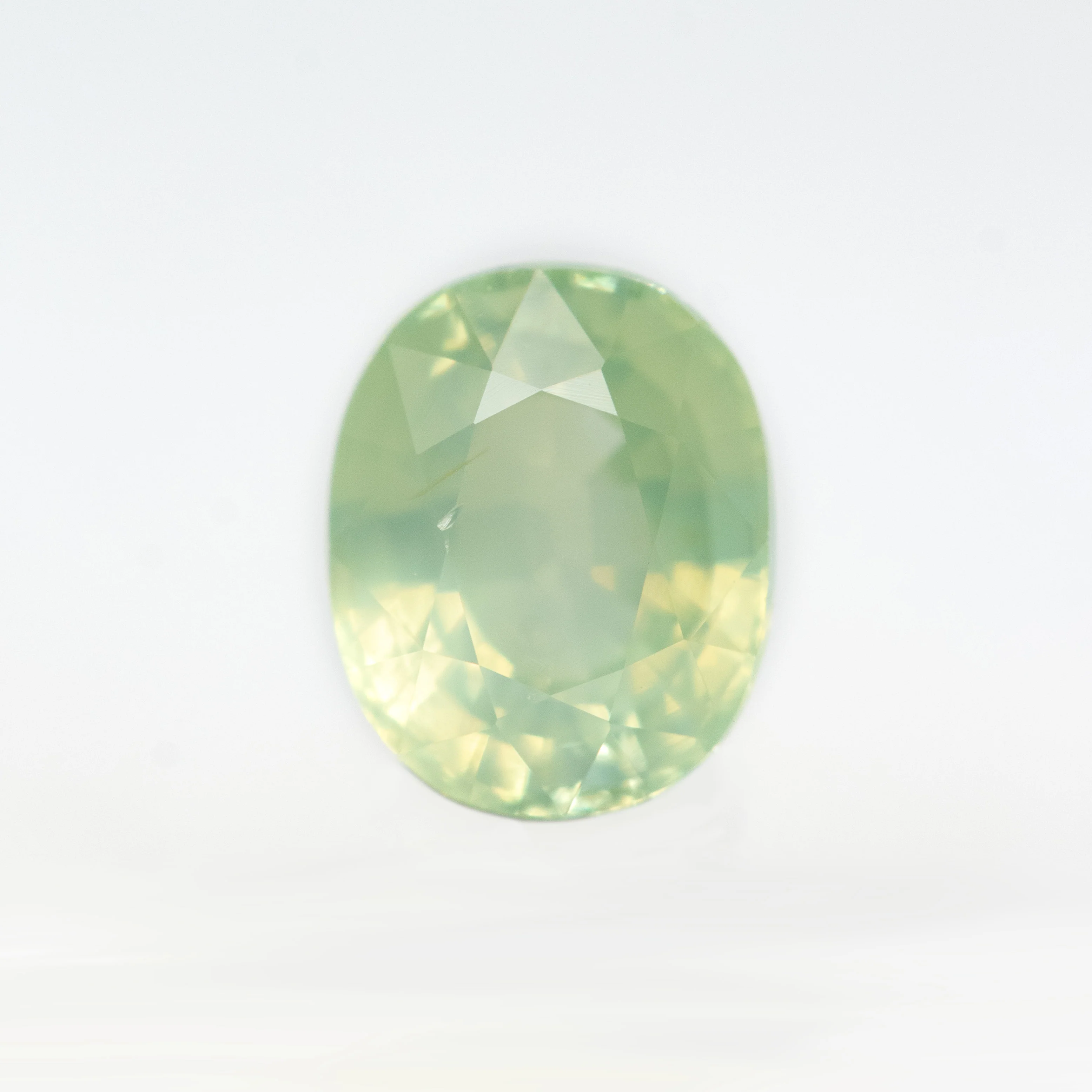 1.03 Carat Light Green Oval Sapphire for Custom Work - Inventory Code YGOS103