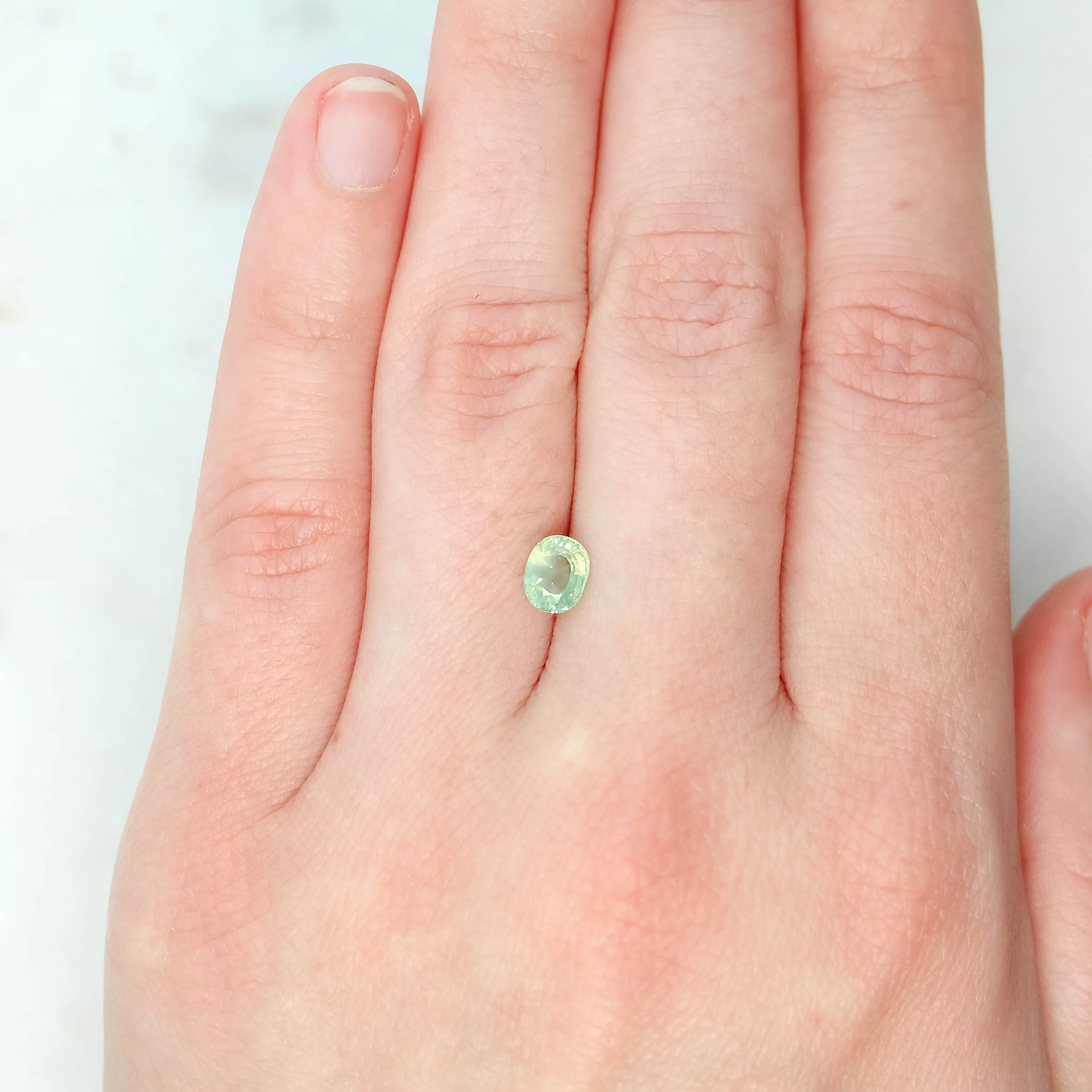 1.03 Carat Light Green Oval Sapphire for Custom Work - Inventory Code YGOS103 - Image 2