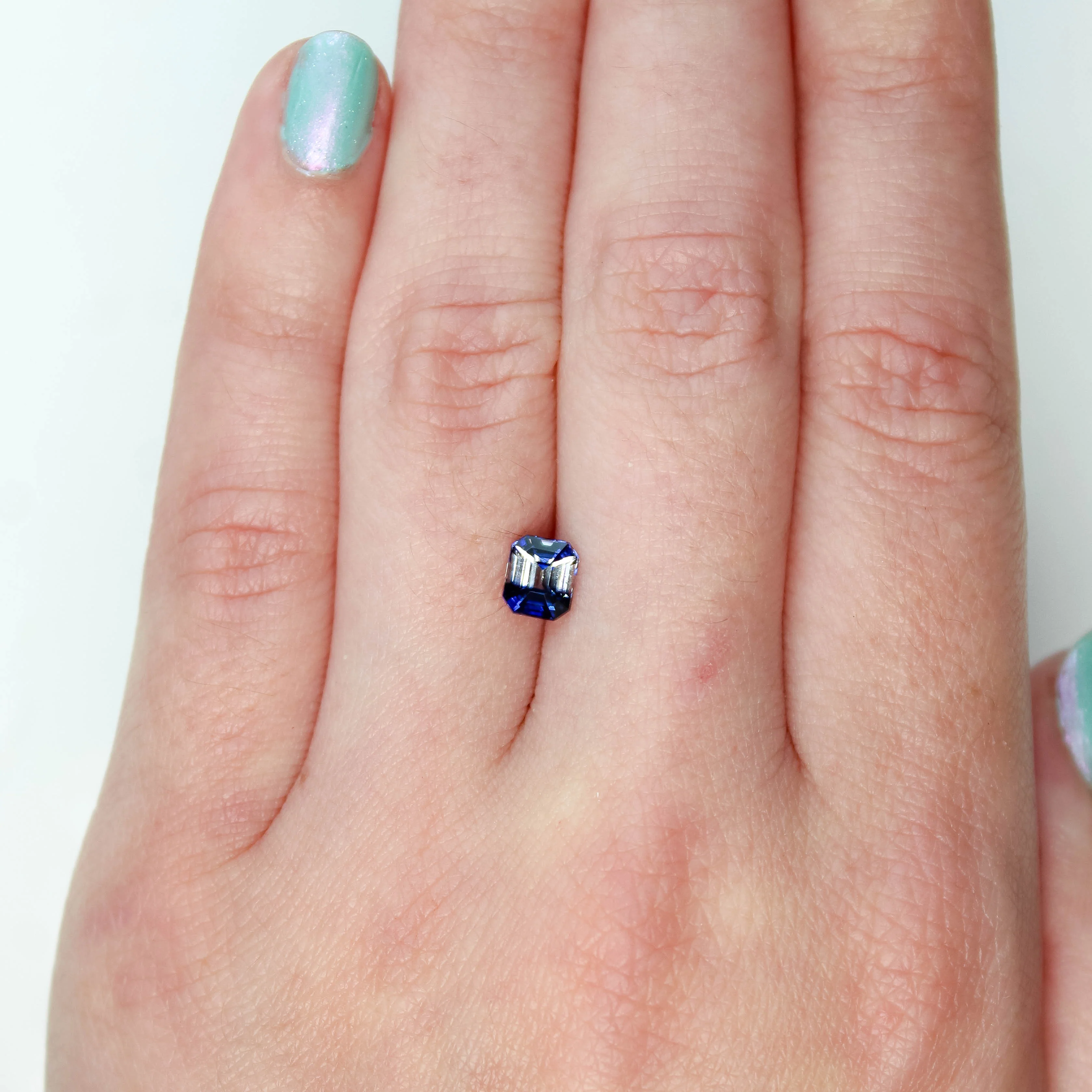 1.04 Carat Bicolor Clear Blue Emerald Cut Sapphire for Custom Work - Inventory Code CBES104 - Image 2