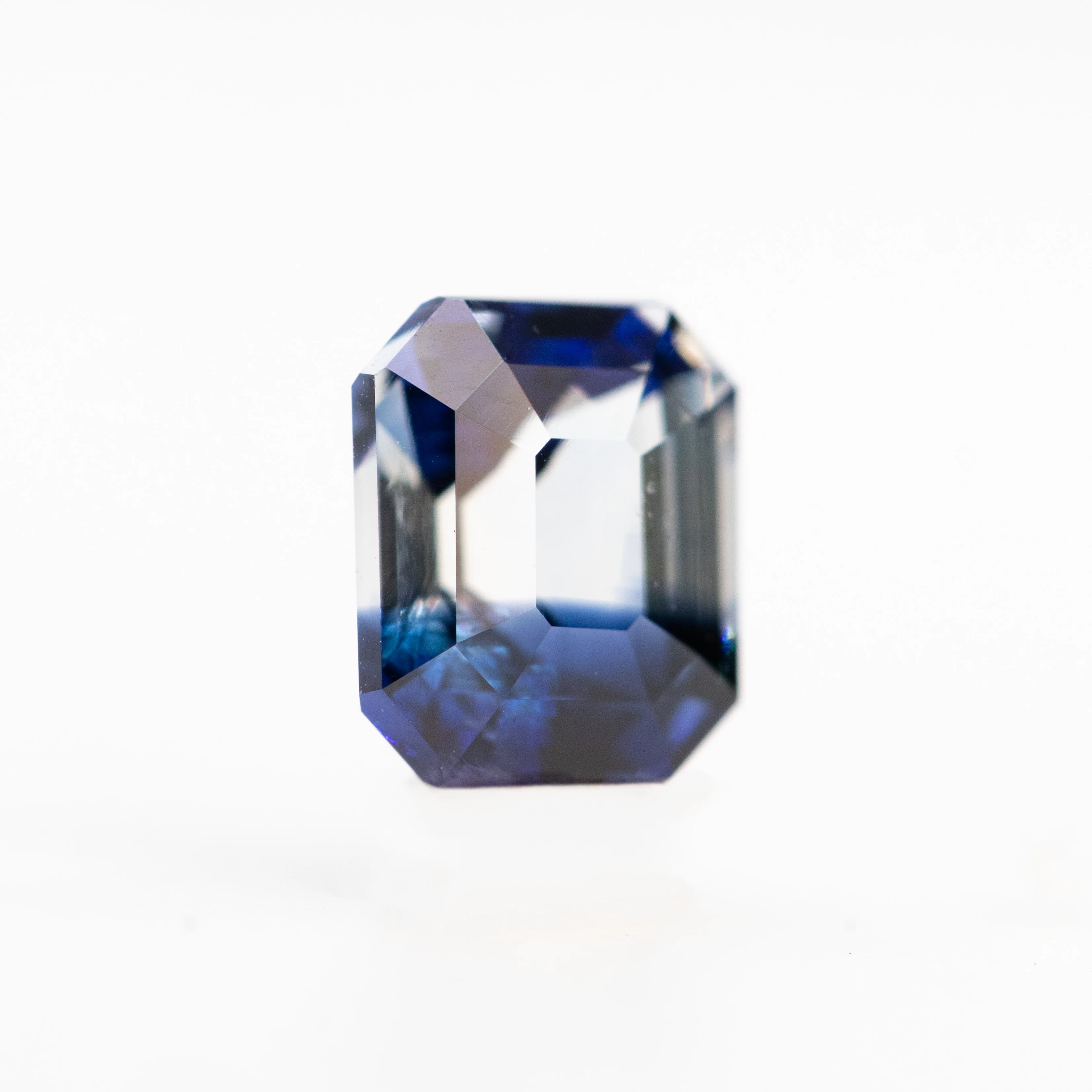 1.04 Carat Bicolor Clear Blue Emerald Cut Sapphire for Custom Work - Inventory Code CBES104 - Image 4