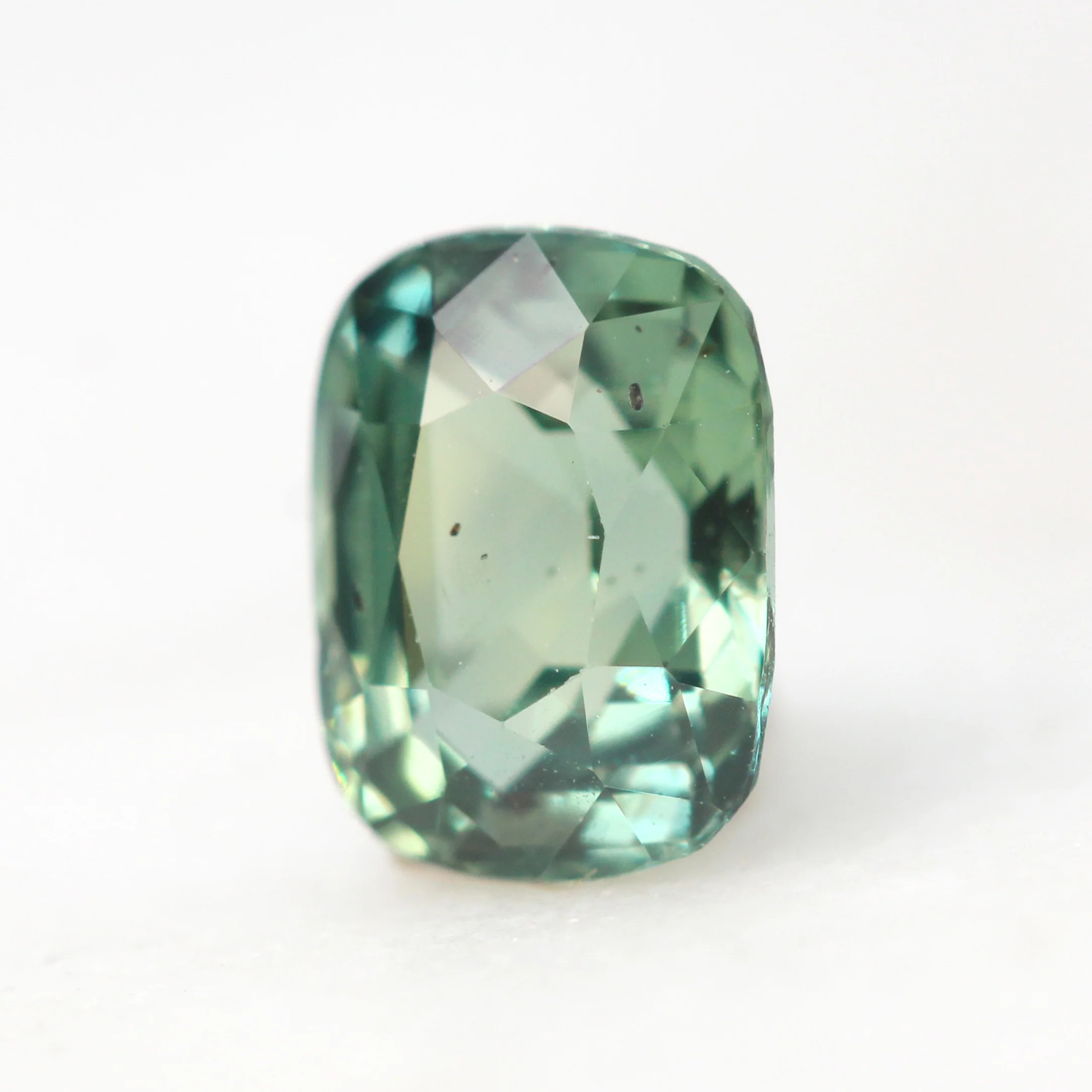 1.09 Carat Light Green Cushion Cut Sapphire for Custom Work - Inventory Code TGCS109 - Image 3
