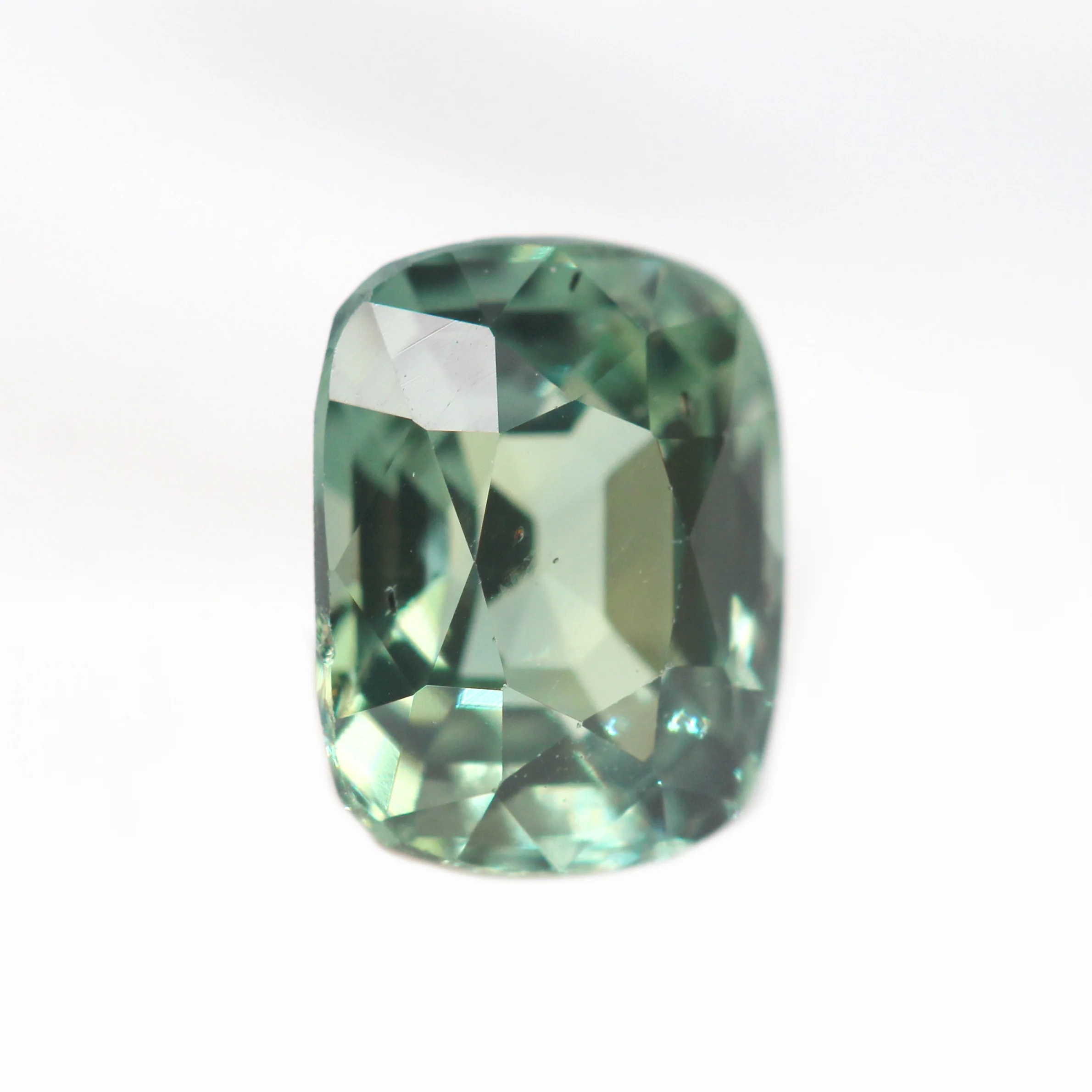 1.09 Carat Light Green Cushion Cut Sapphire for Custom Work - Inventory Code TGCS109 - Image 4