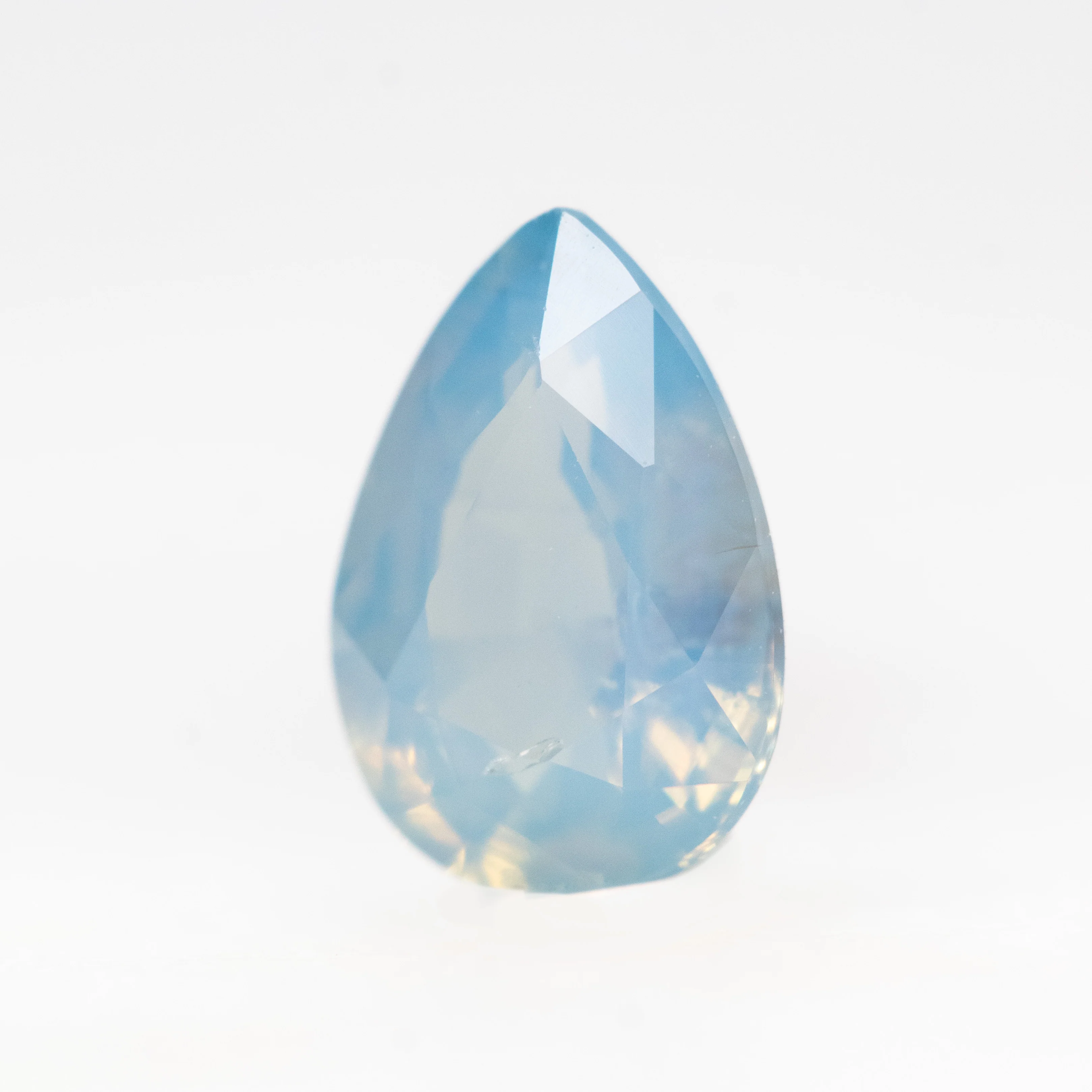 1.09 Carat Opalescent Blue Pear Sapphire for Custom Work - Inventory Code LBPS109 - Image 3