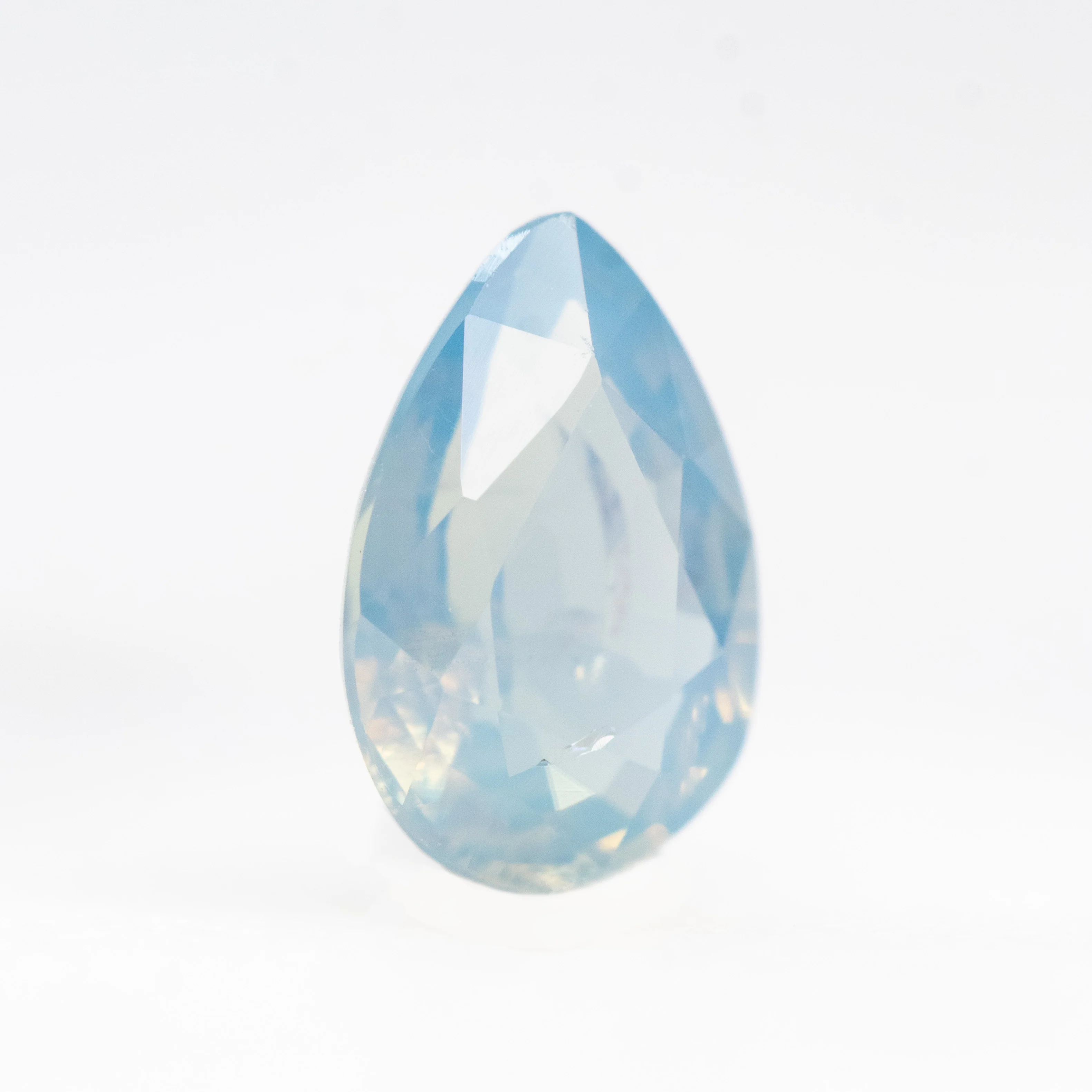 1.09 Carat Opalescent Blue Pear Sapphire for Custom Work - Inventory Code LBPS109 - Image 4