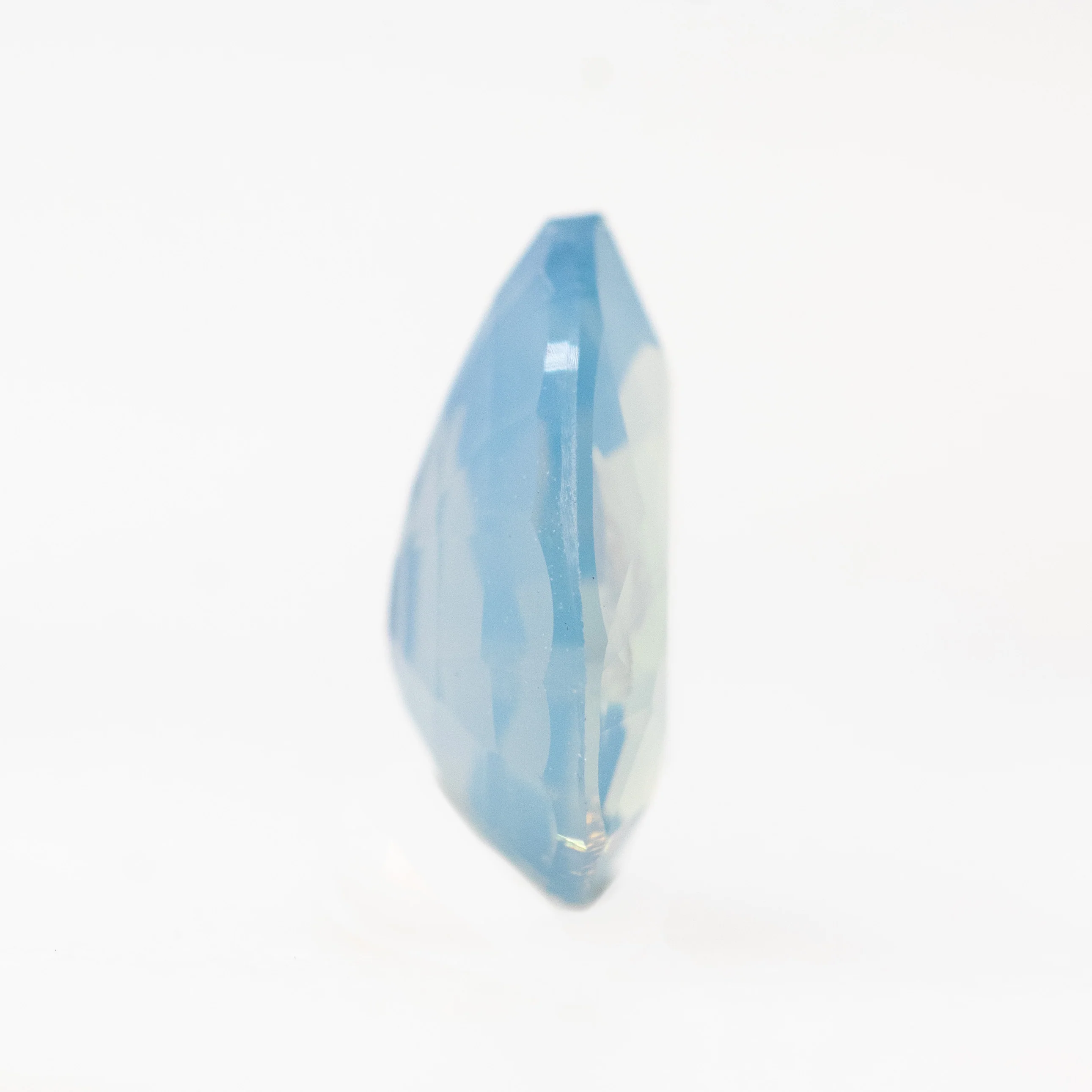 1.09 Carat Opalescent Blue Pear Sapphire for Custom Work - Inventory Code LBPS109 - Image 5