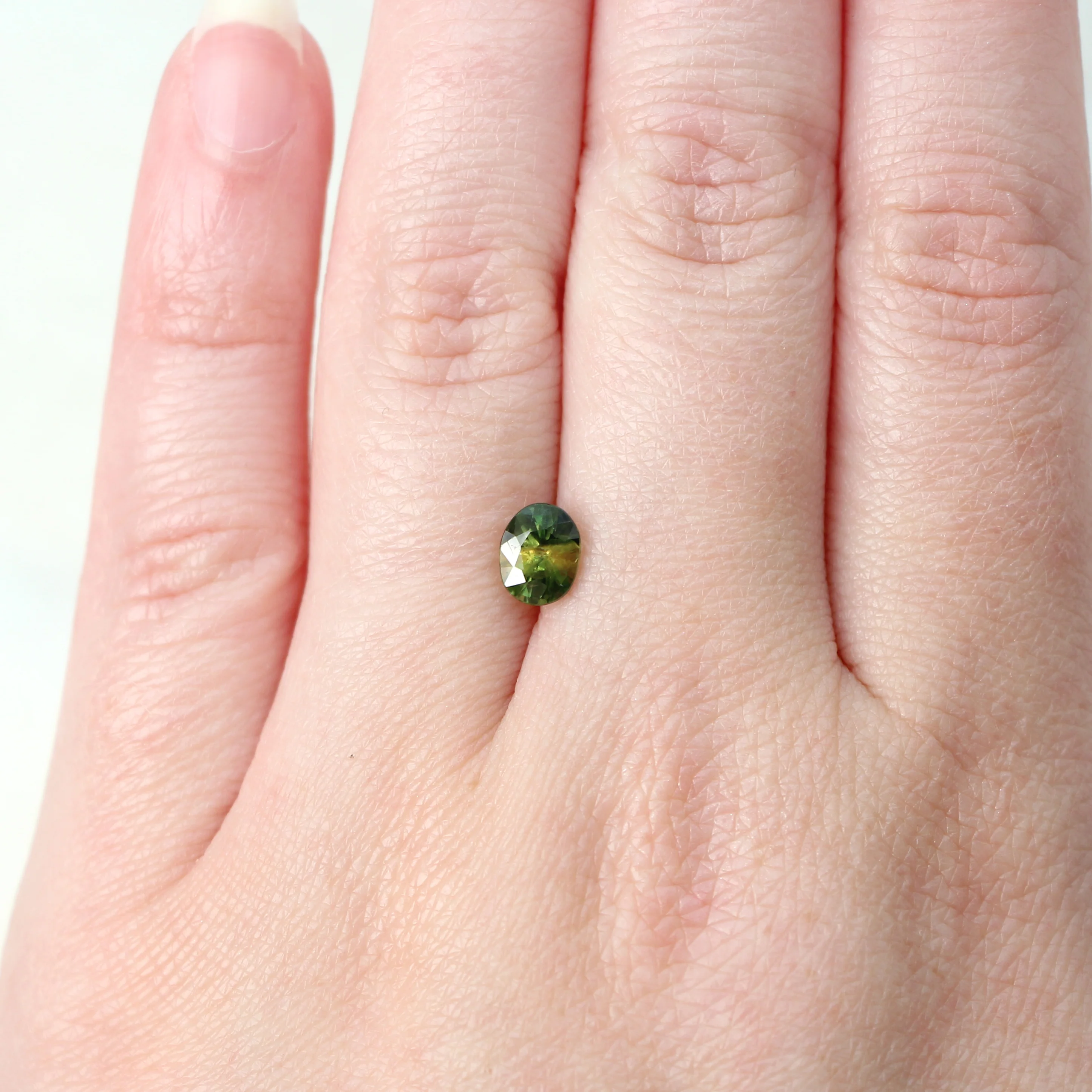1.15 Carat Bicolor Yellow Green Oval Sapphire for Custom Work - Inventory Code YGOS115 - Image 2