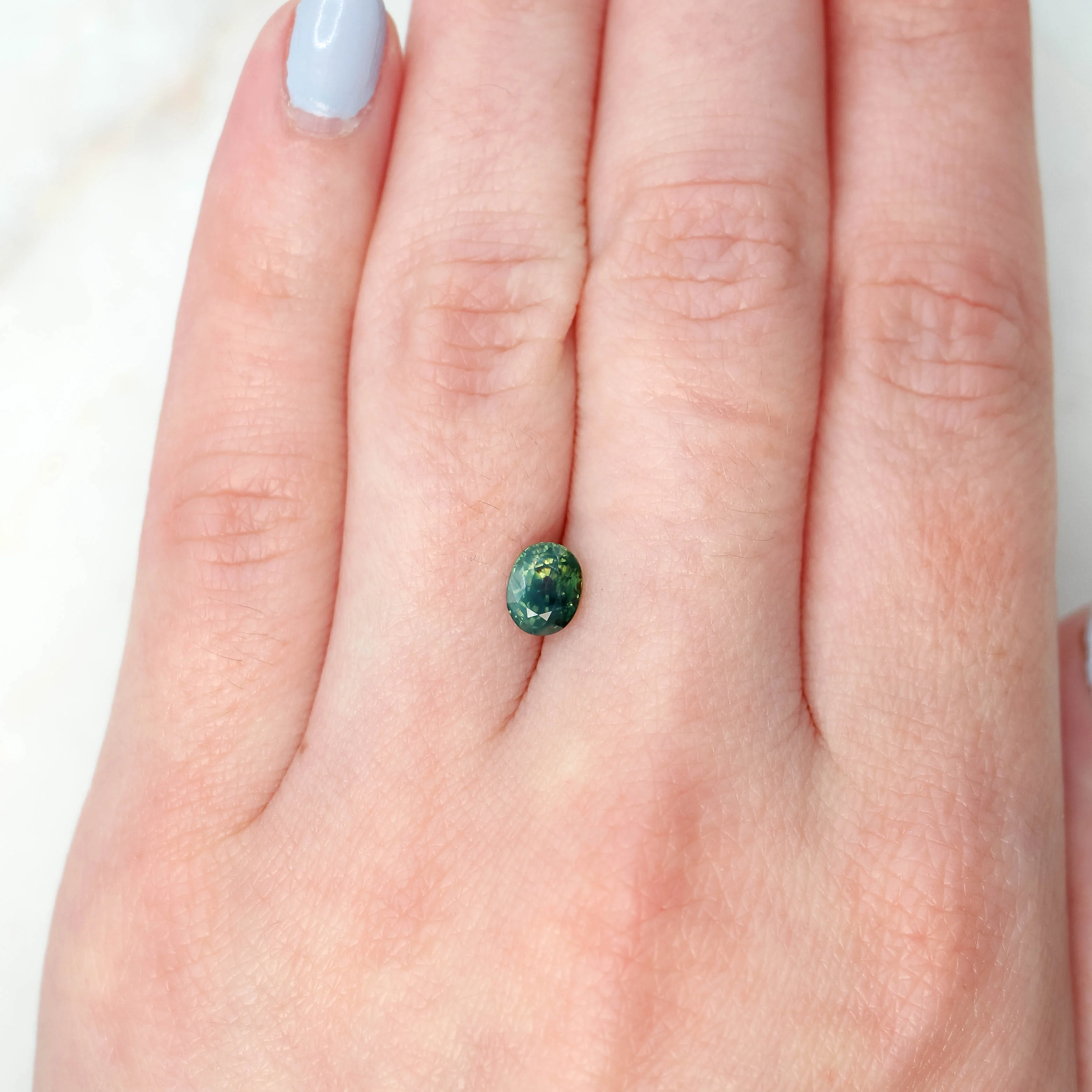 1.23 Carat Teal Green Oval Sapphire for Custom Work - Inventory Code TOS123b - Image 2