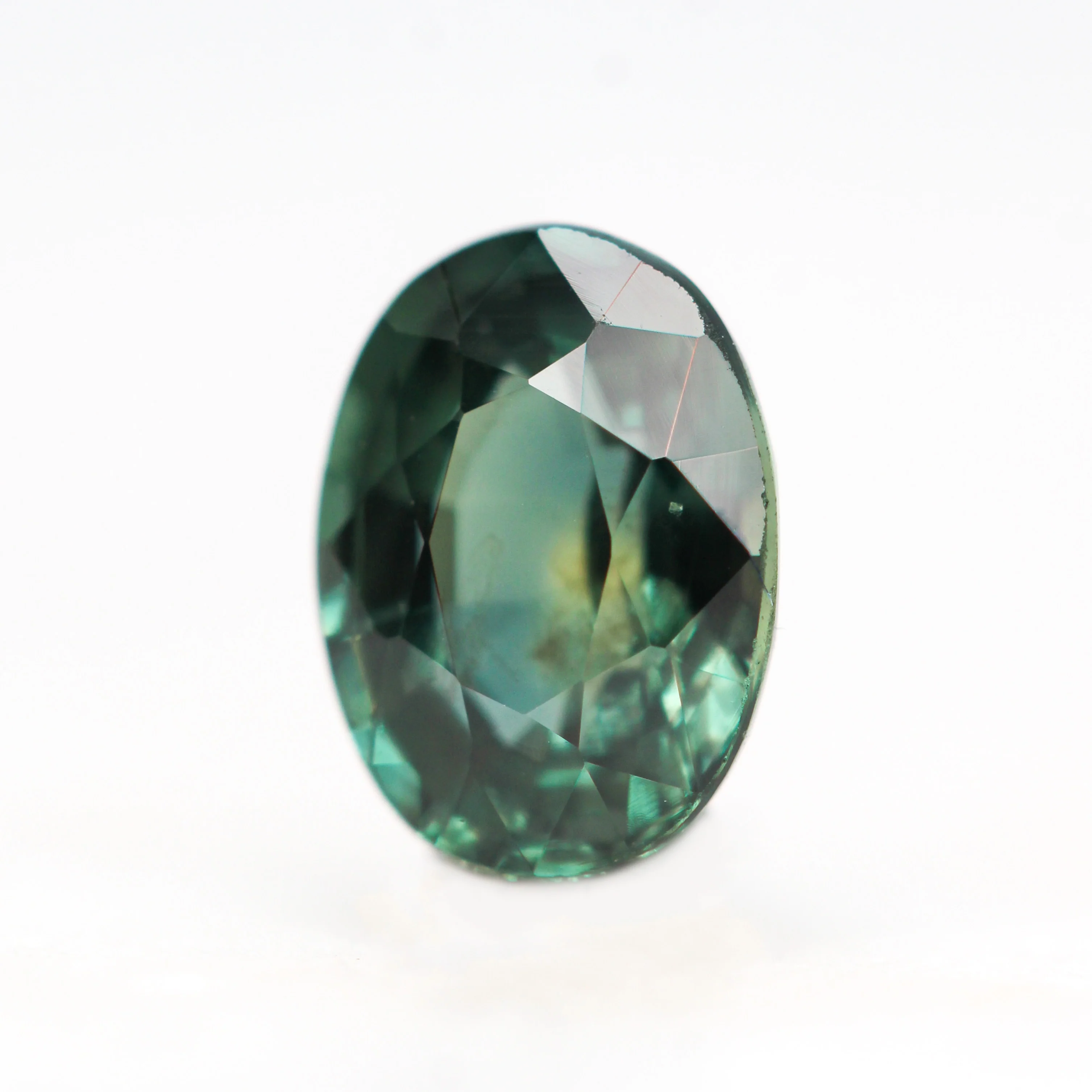 1.33 Carat Teal Green Oval Sapphire for Custom Work - Inventory Code TOS133 - Image 3