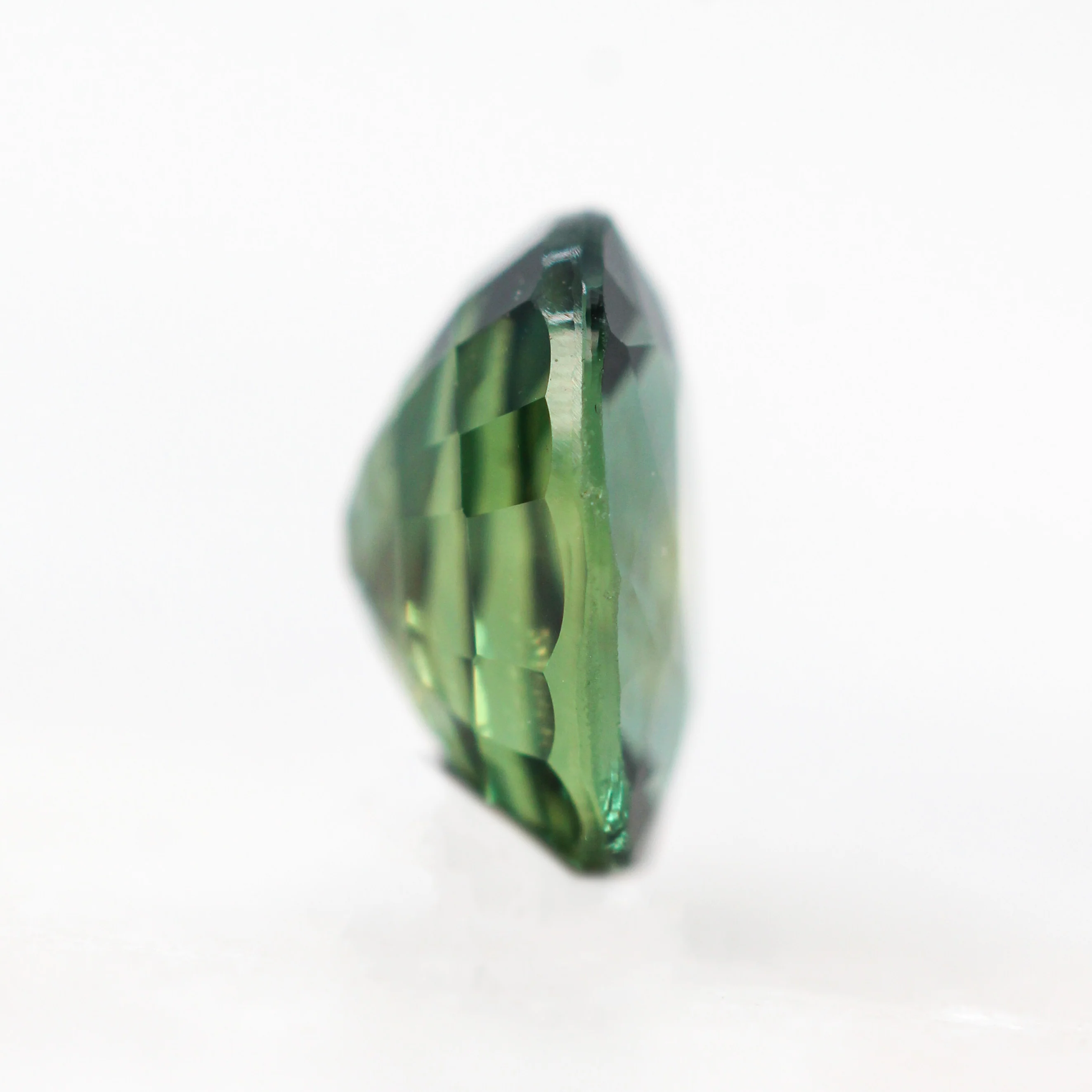 1.33 Carat Teal Green Oval Sapphire for Custom Work - Inventory Code TOS133 - Image 5