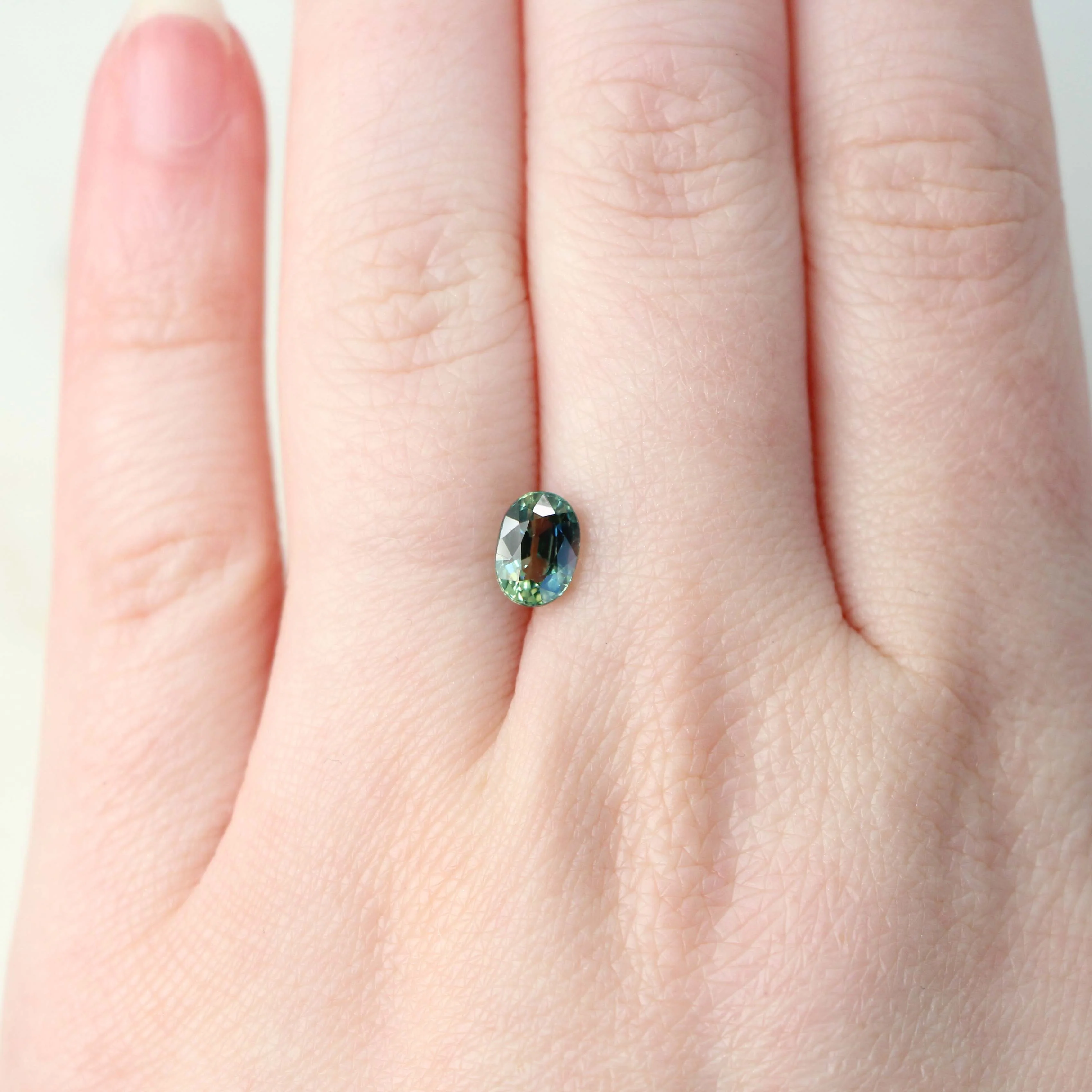 1.42 Carat Bicolor Green-Blue Oval Sapphire for Custom Work - Inventory Code BGOSAP142 - Image 2