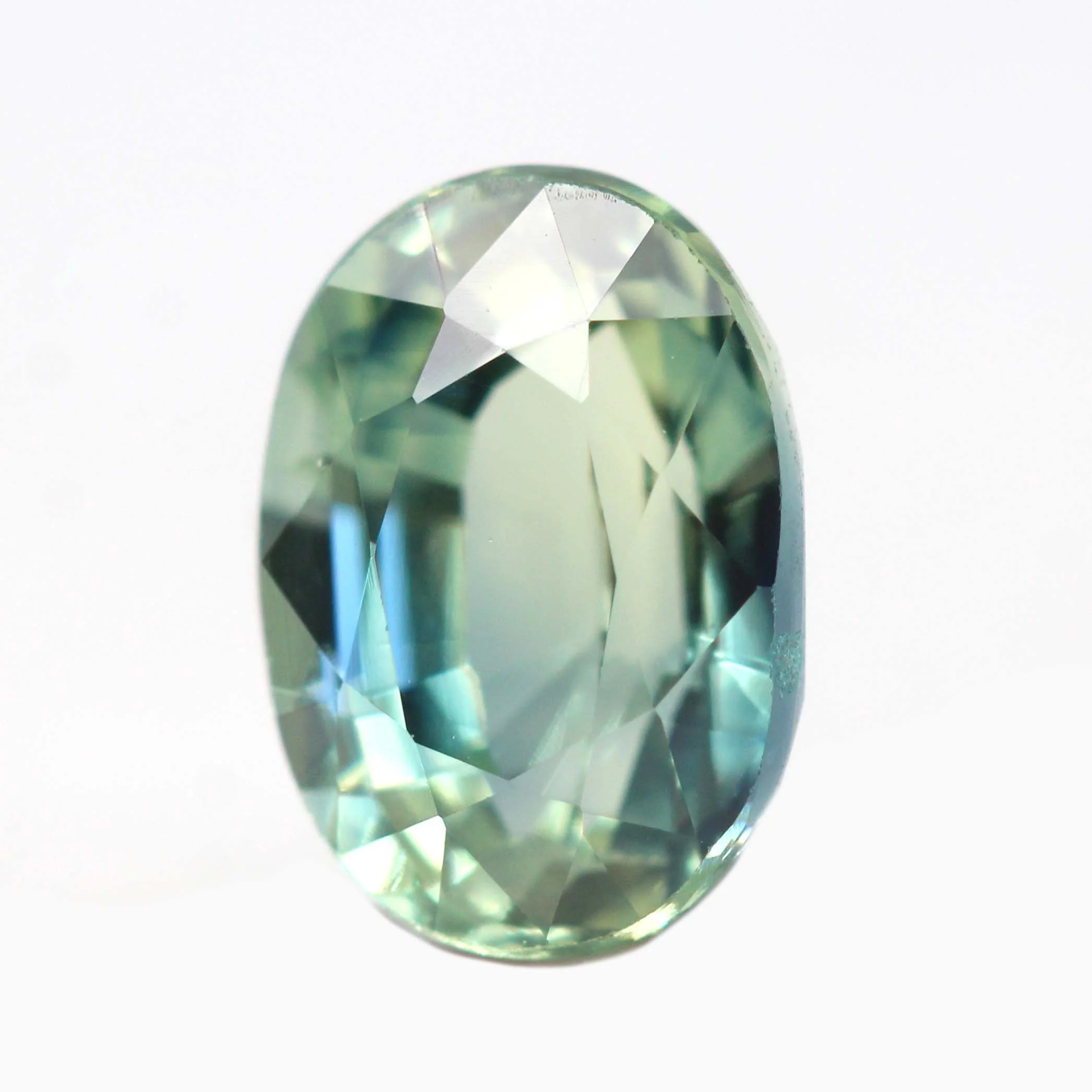 1.42 Carat Bicolor Green-Blue Oval Sapphire for Custom Work - Inventory Code BGOSAP142 - Image 3