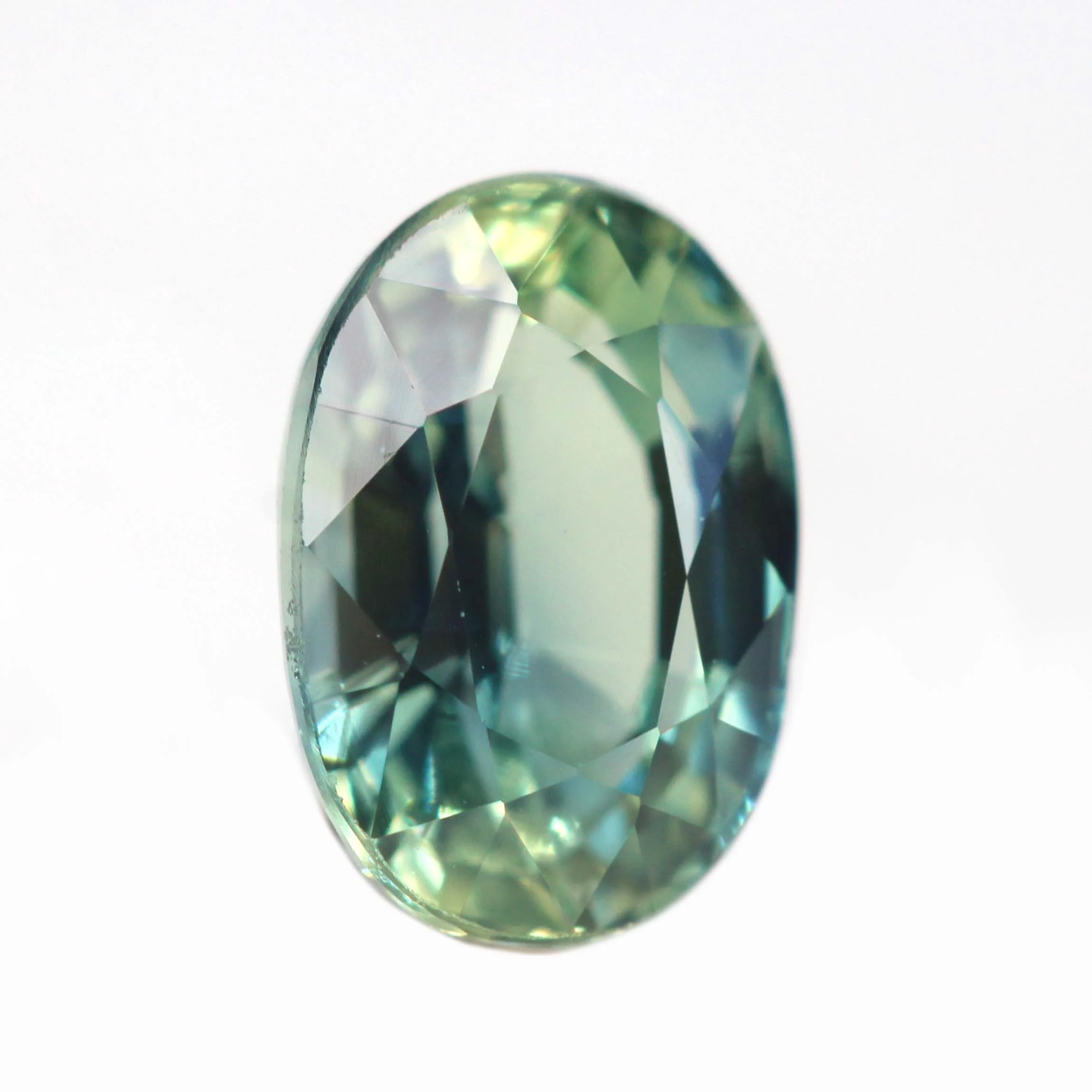 1.42 Carat Bicolor Green-Blue Oval Sapphire for Custom Work - Inventory Code BGOSAP142 - Image 4