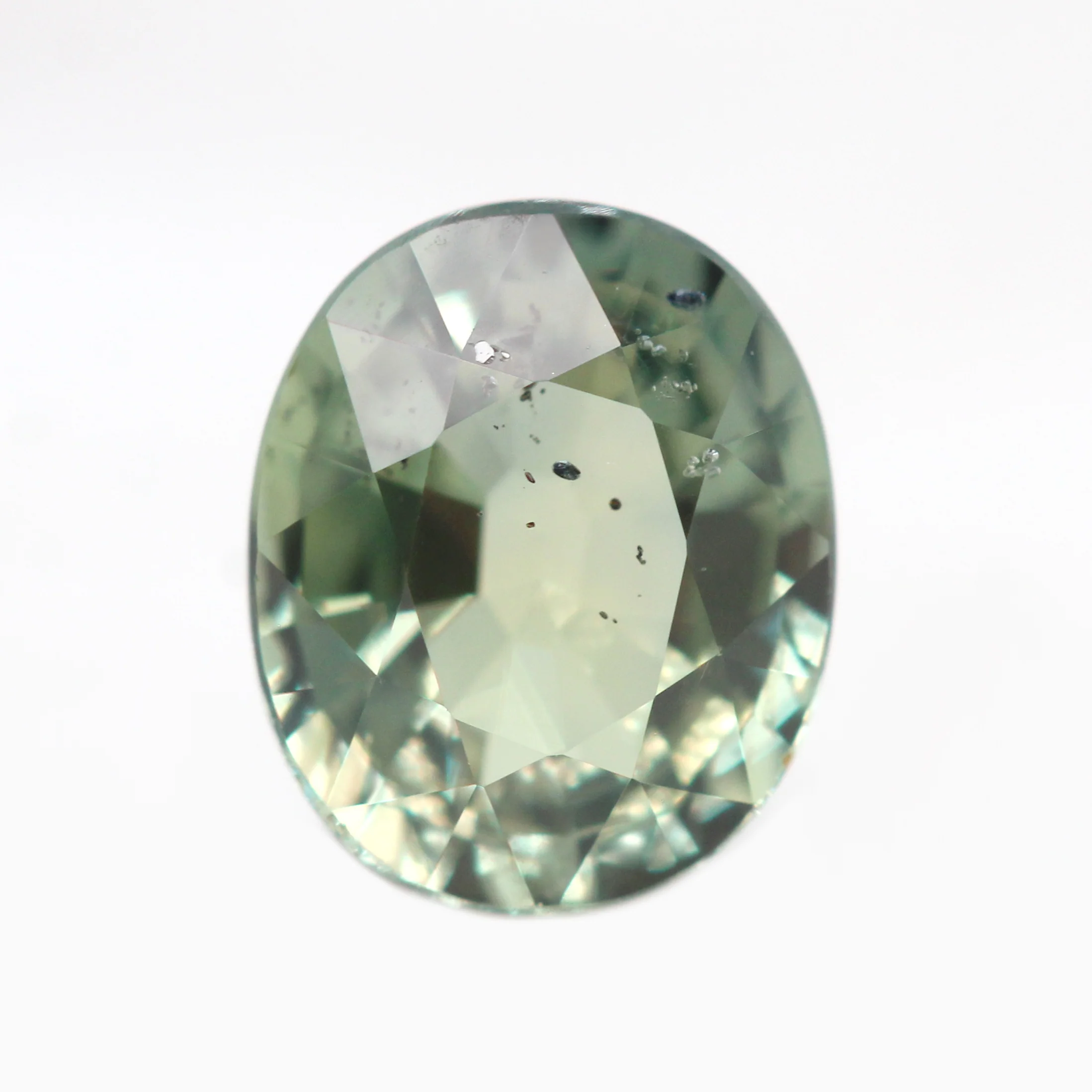 1.44 Carat Light Green Oval Sapphire for Custom Work - Inventory Code GOS144