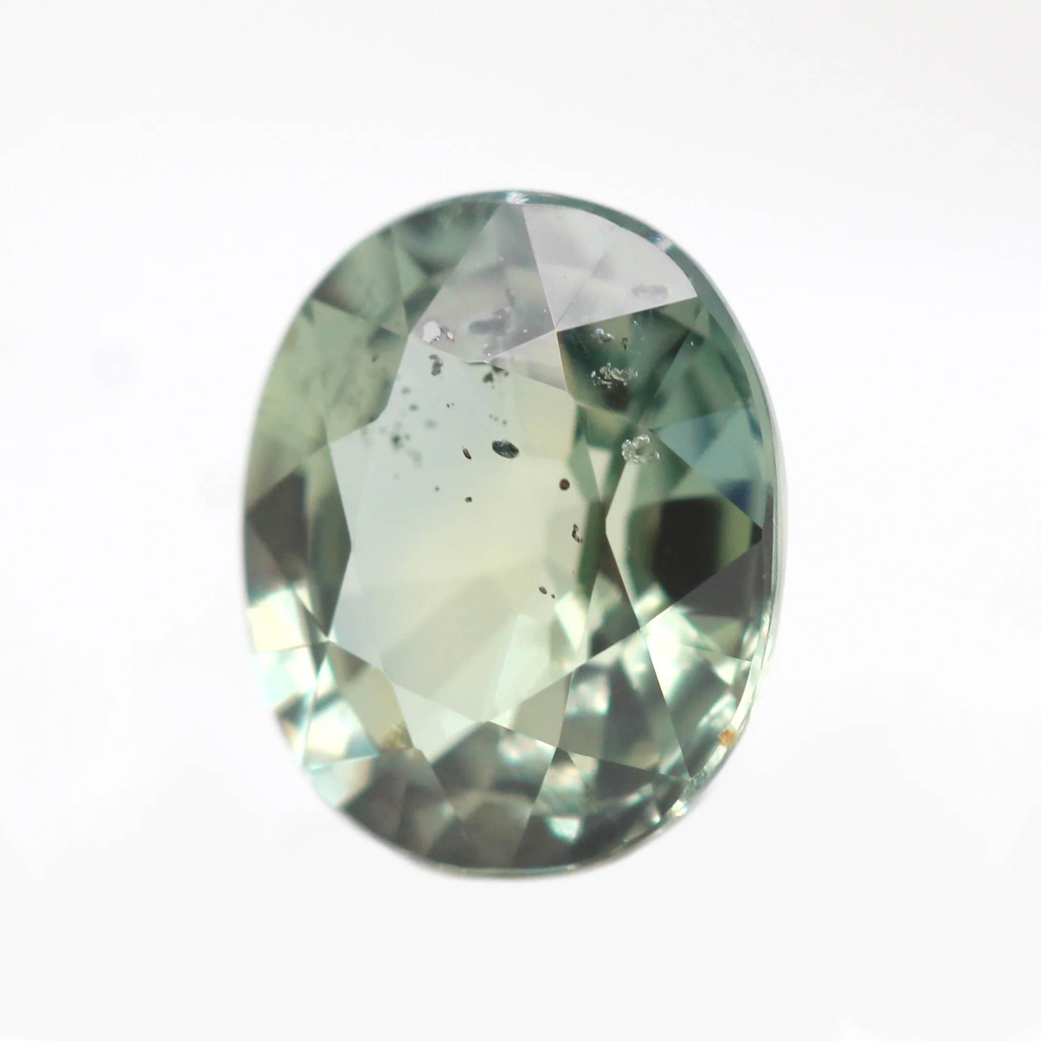 1.44 Carat Light Green Oval Sapphire for Custom Work - Inventory Code GOS144 - Image 4