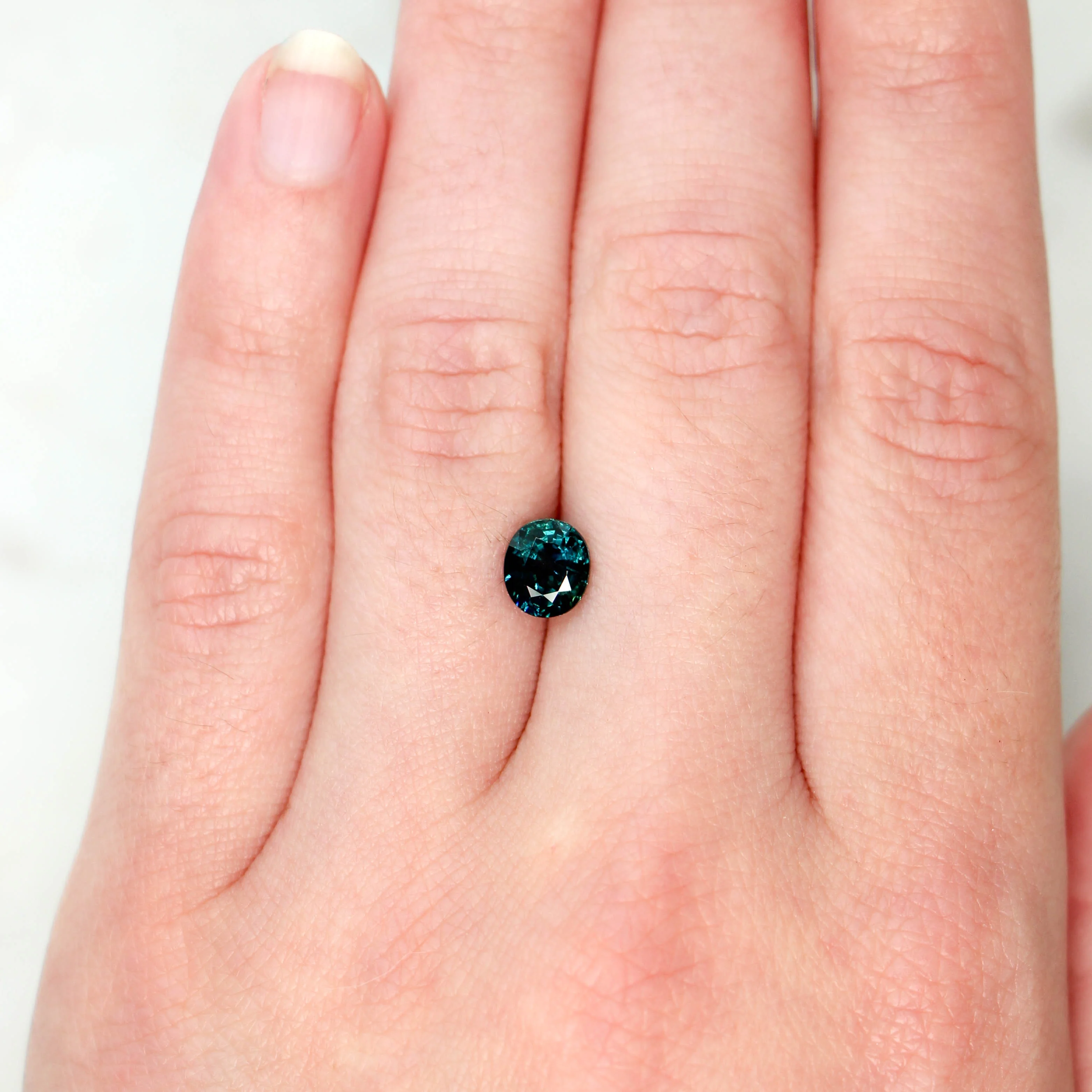 1.45 Carat Dark Teal Oval Sapphire for Custom Work - Inventory Code TOS145 - Image 2