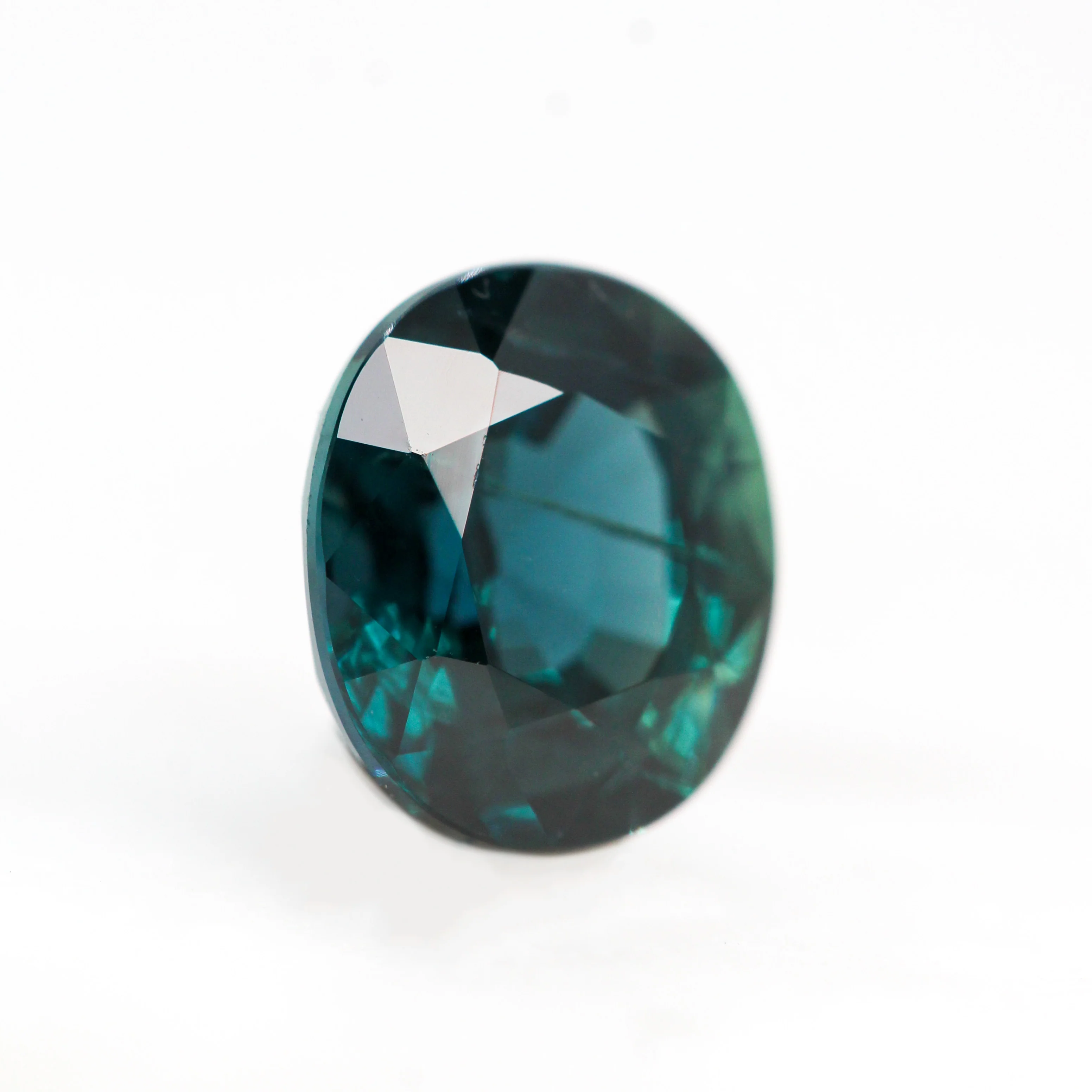 1.45 Carat Dark Teal Oval Sapphire for Custom Work - Inventory Code TOS145 - Image 4