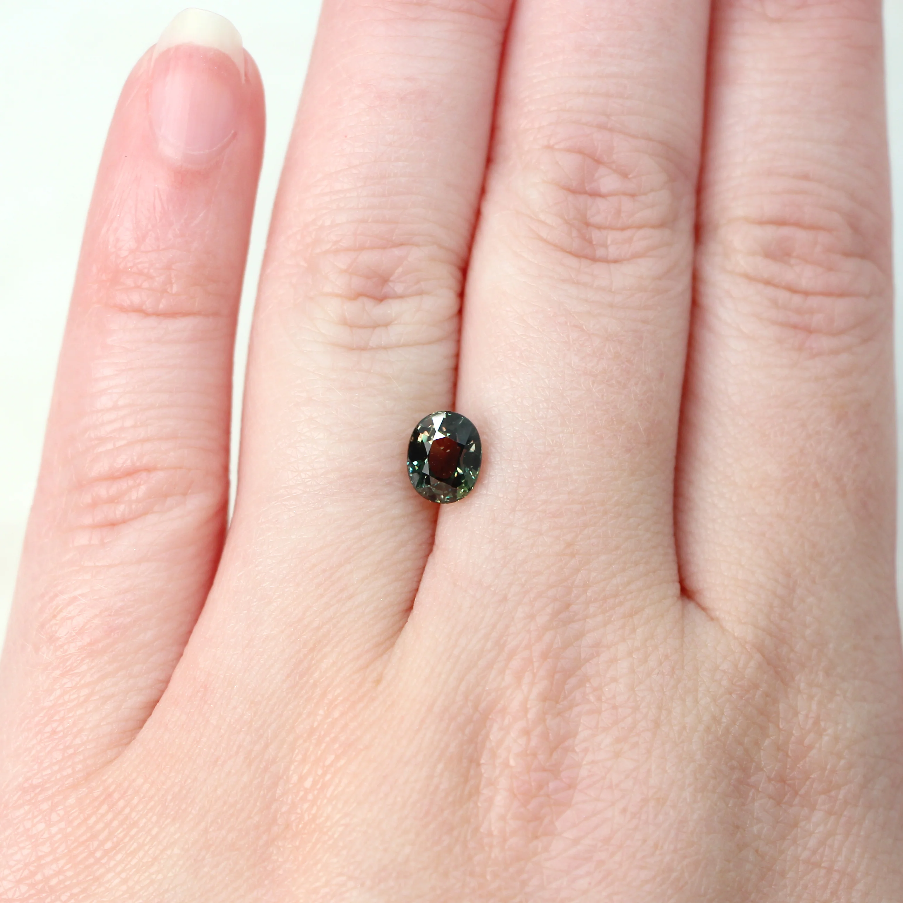 1.71 Carat Color Change Green + Brown Oval Sapphire for Custom Work - Inventory Code GBOS171 - Image 3