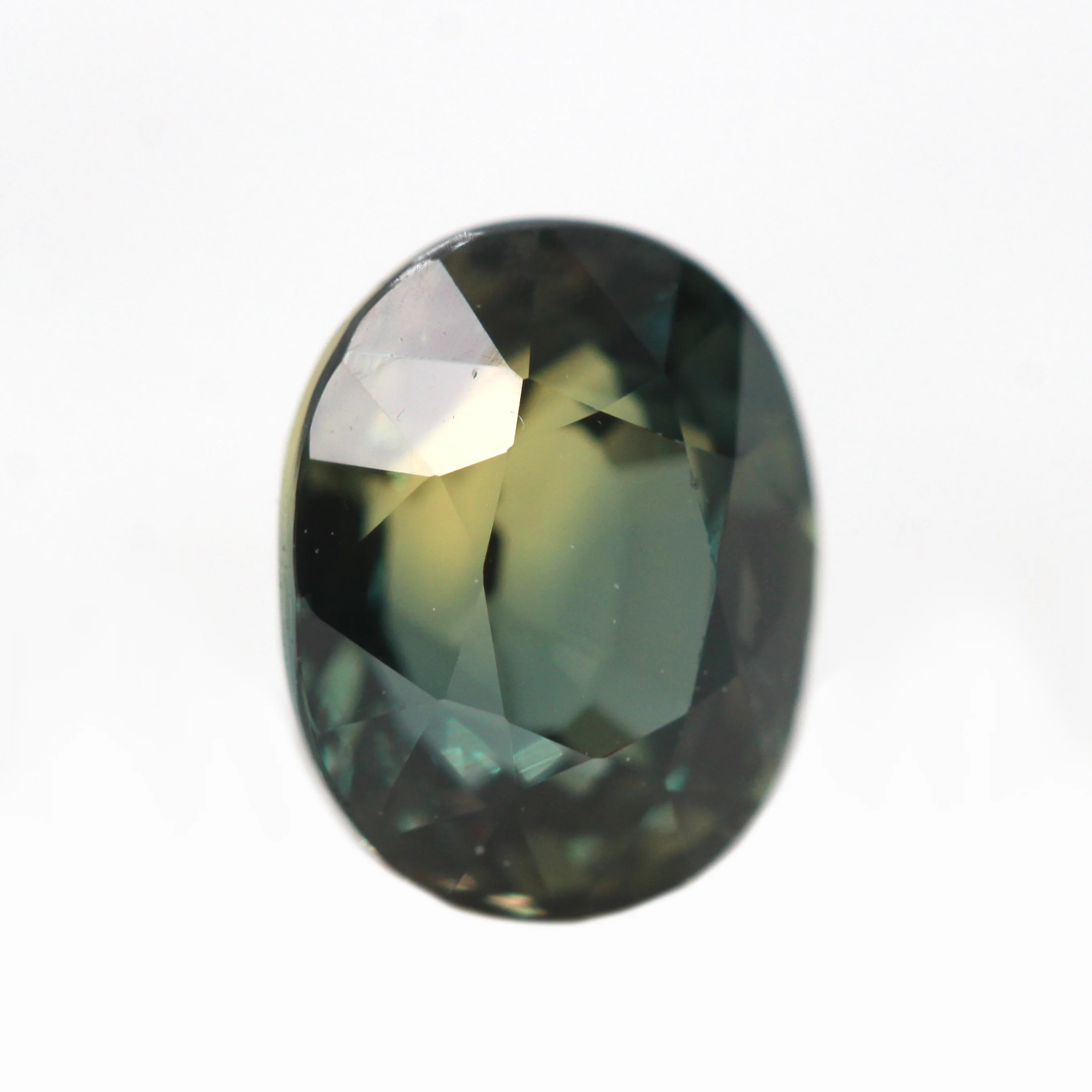 1.71 Carat Color Change Green + Brown Oval Sapphire for Custom Work - Inventory Code GBOS171 - Image 5