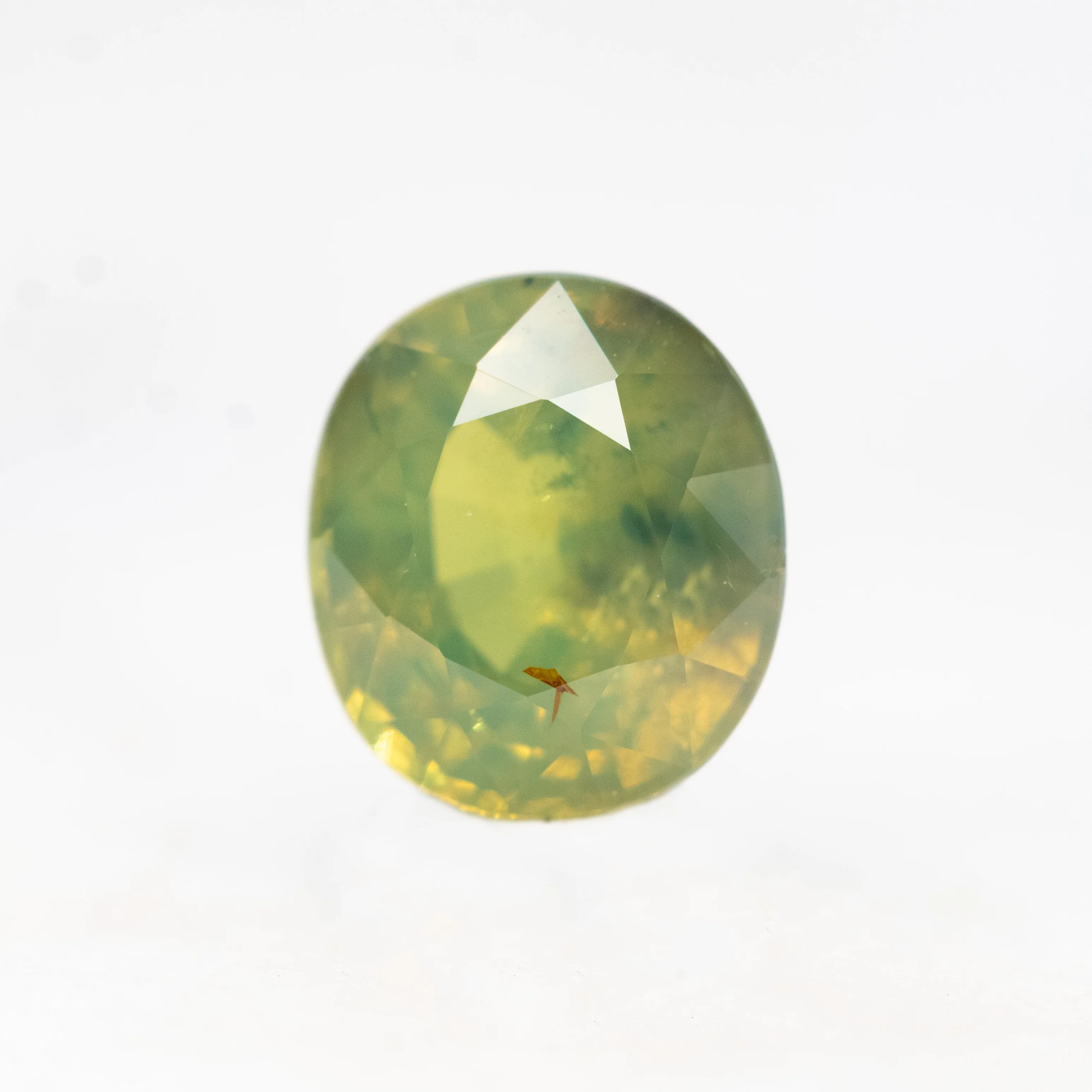 1.87 Light Green Opalescent Oval Sapphire for Custom Work - Inventory Code LGOS187