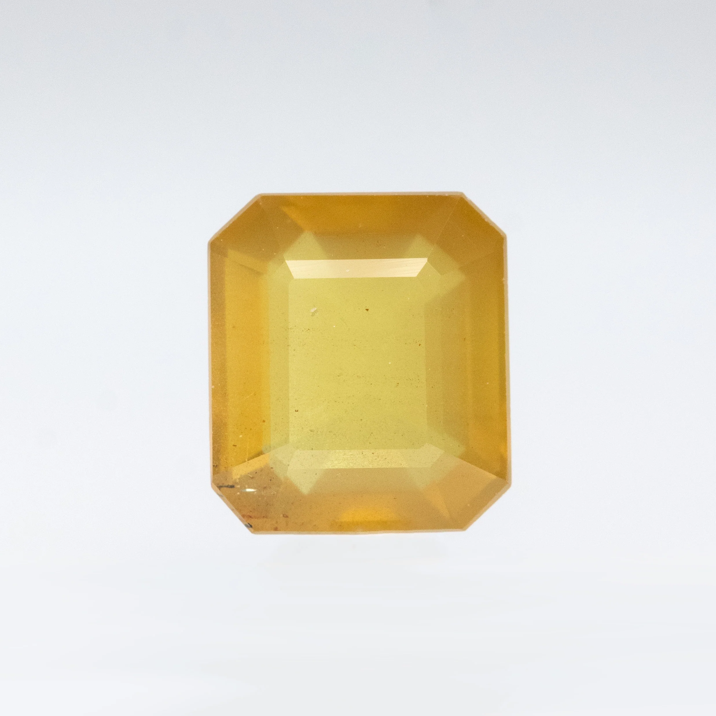 1.89 Carat Yellow-Orange Emerald Cut Sapphire for Custom Work - Inventory Code OES189