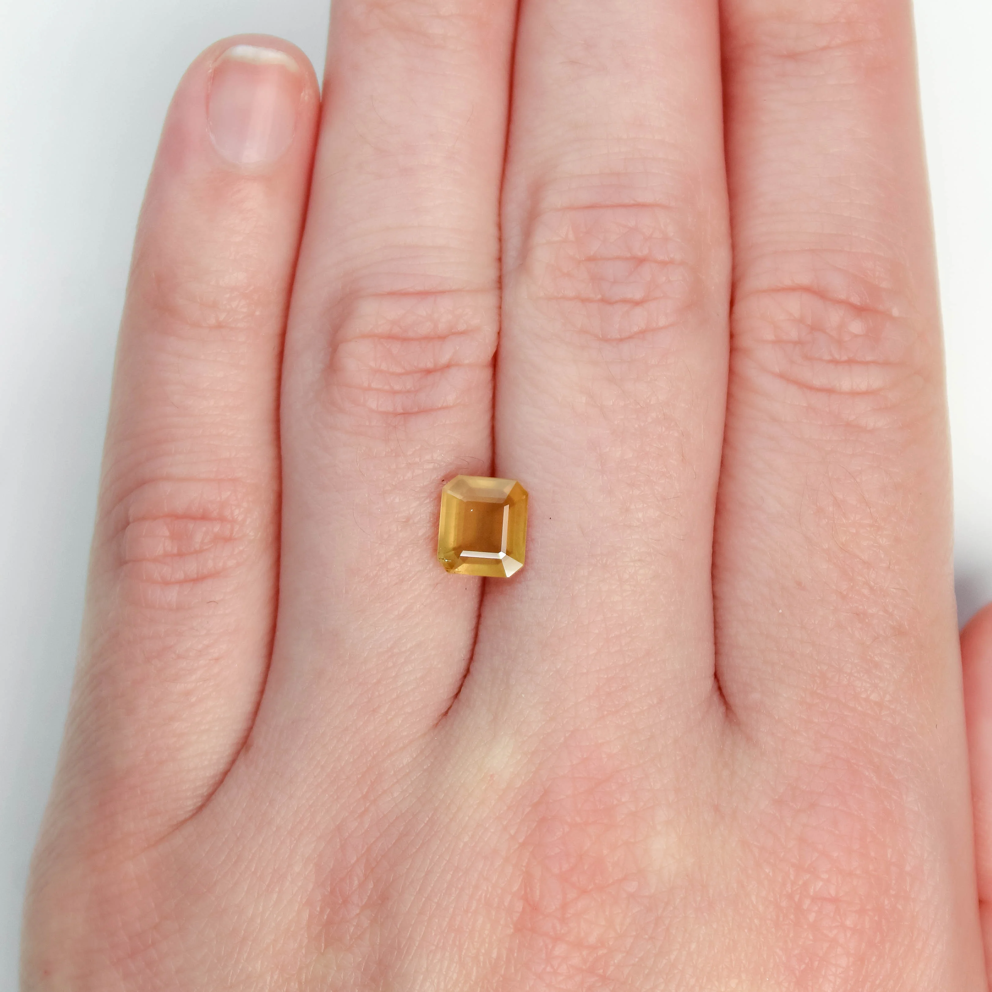 1.89 Carat Yellow-Orange Emerald Cut Sapphire for Custom Work - Inventory Code OES189 - Image 2