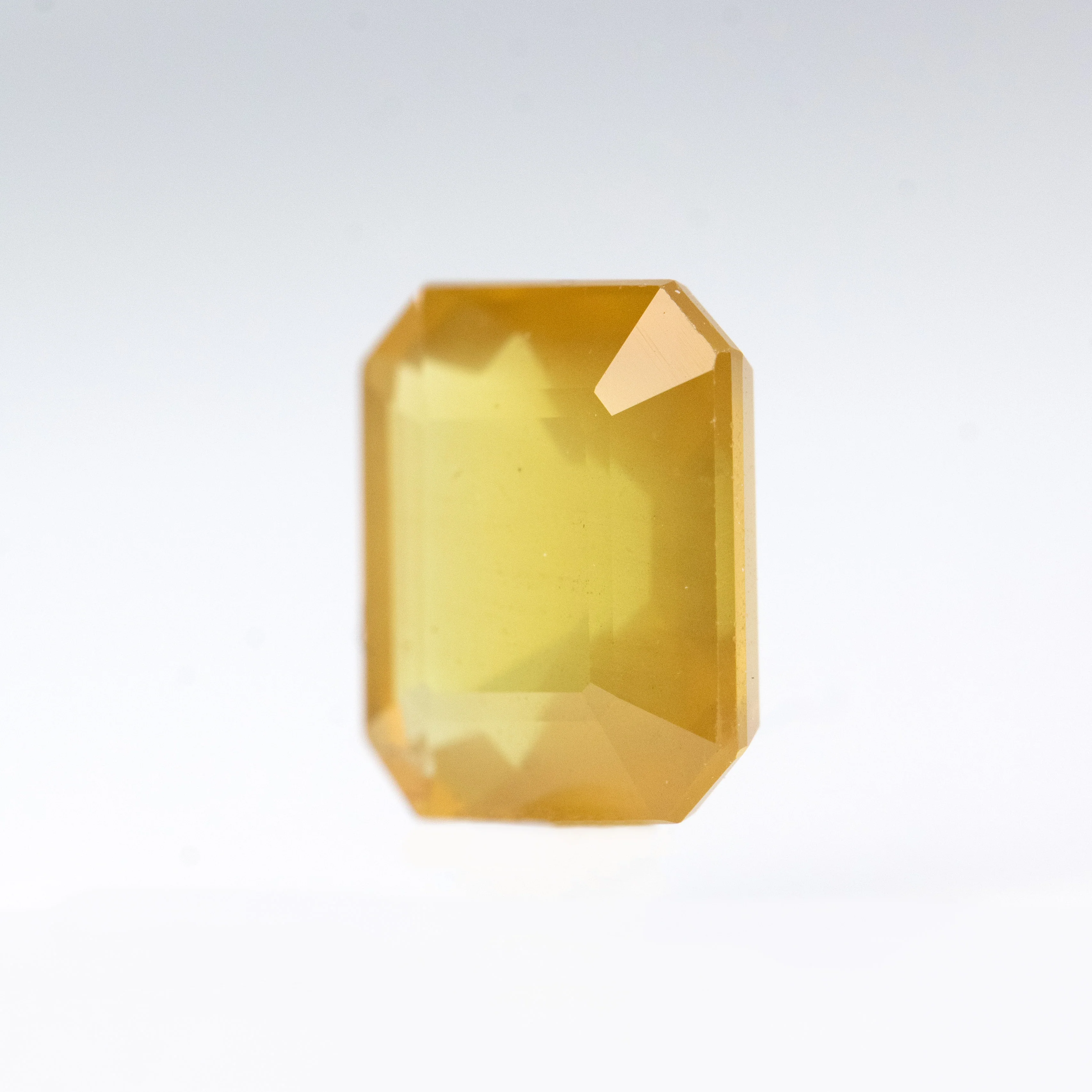 1.89 Carat Yellow-Orange Emerald Cut Sapphire for Custom Work - Inventory Code OES189 - Image 3