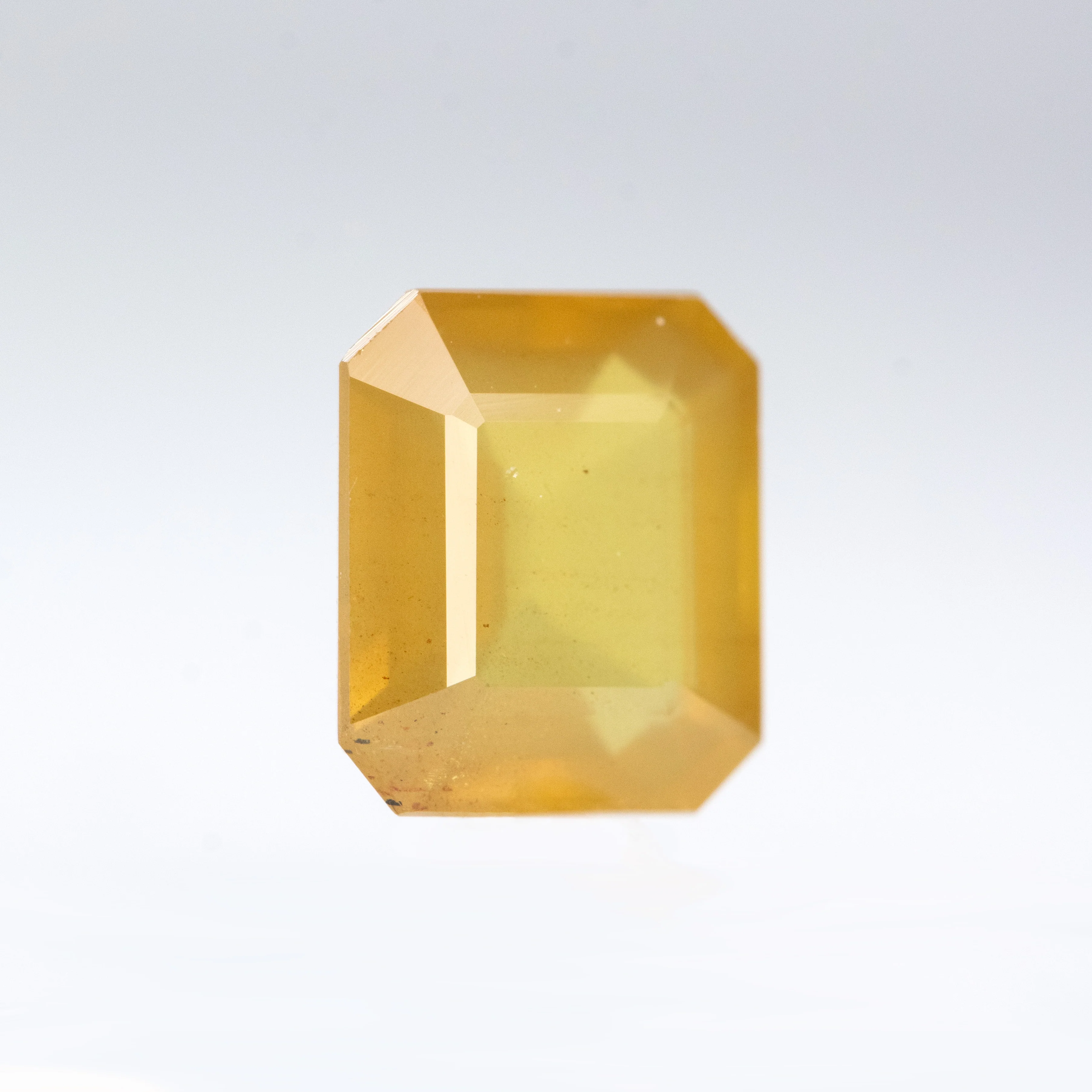 1.89 Carat Yellow-Orange Emerald Cut Sapphire for Custom Work - Inventory Code OES189 - Image 4